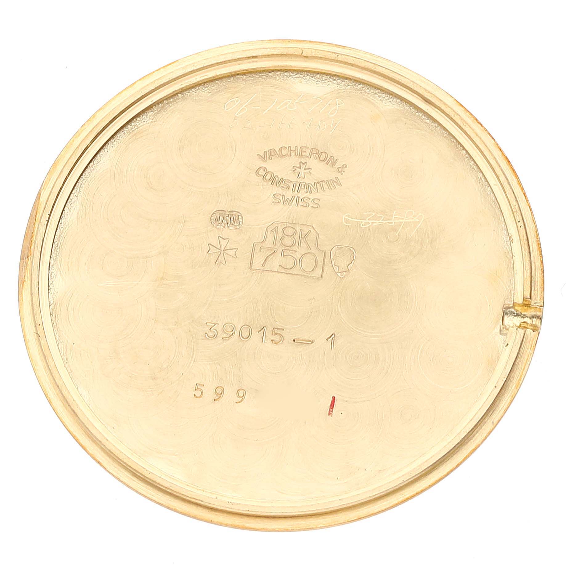 The image shows the inside of the back cover of a Vintage Vacheron Constantin watch, highlighting its engravings and hallmarks.