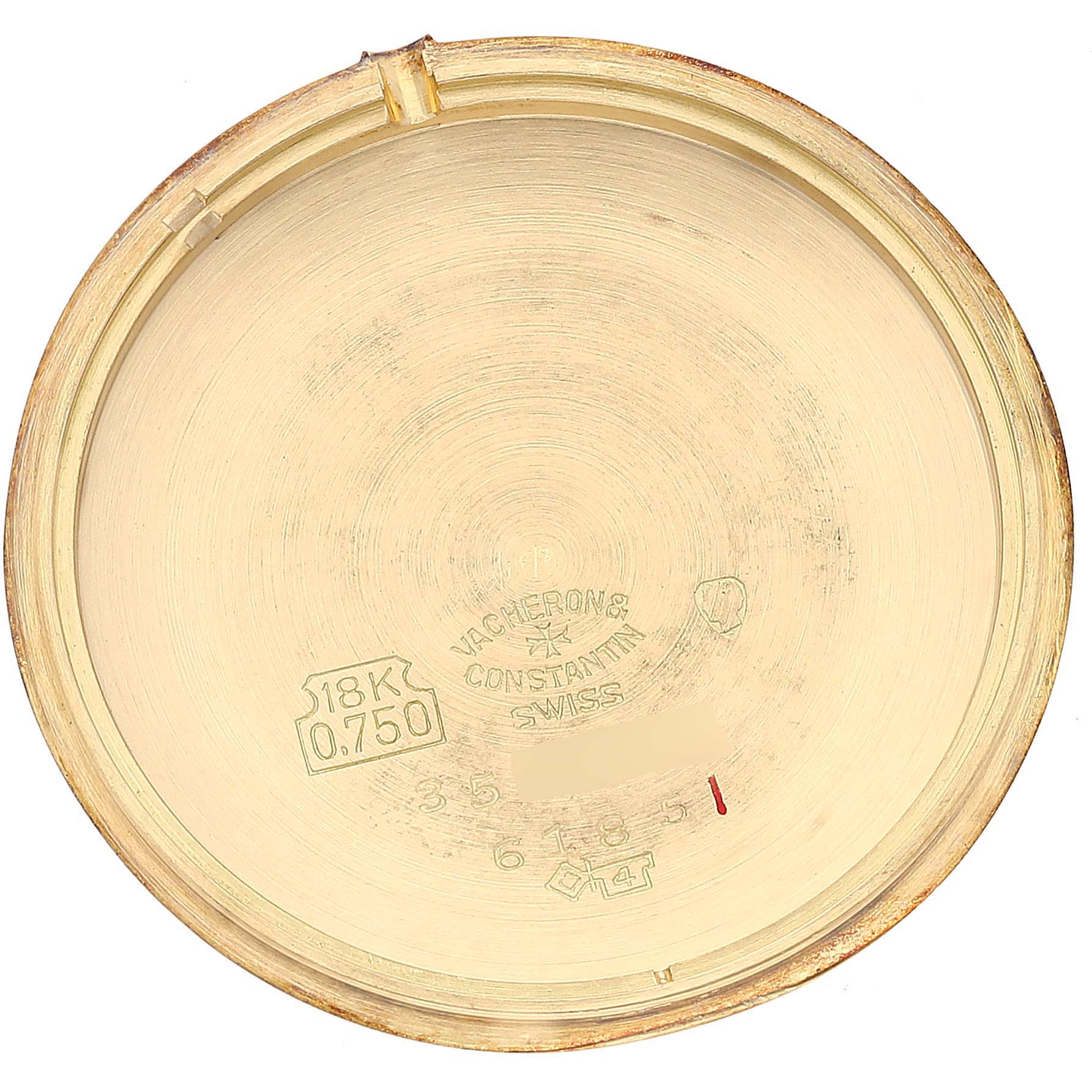 This image shows the inside of the case back of a Vintage Vacheron Constantin watch, displaying manufacturer markings and gold content stamps.