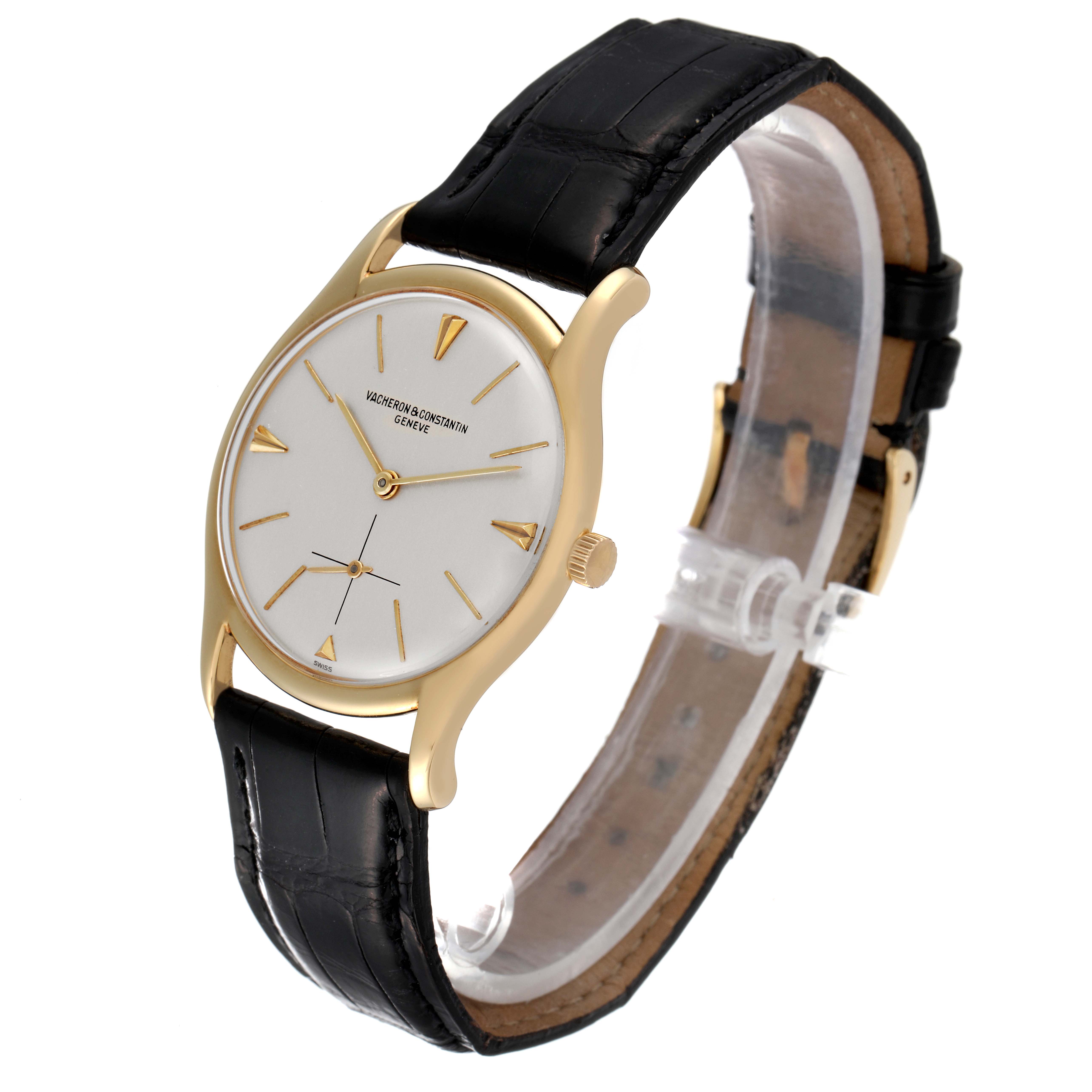 This image shows a side angle of a Vintage Vacheron Constantin watch, highlighting its dial, hands, and leather strap.