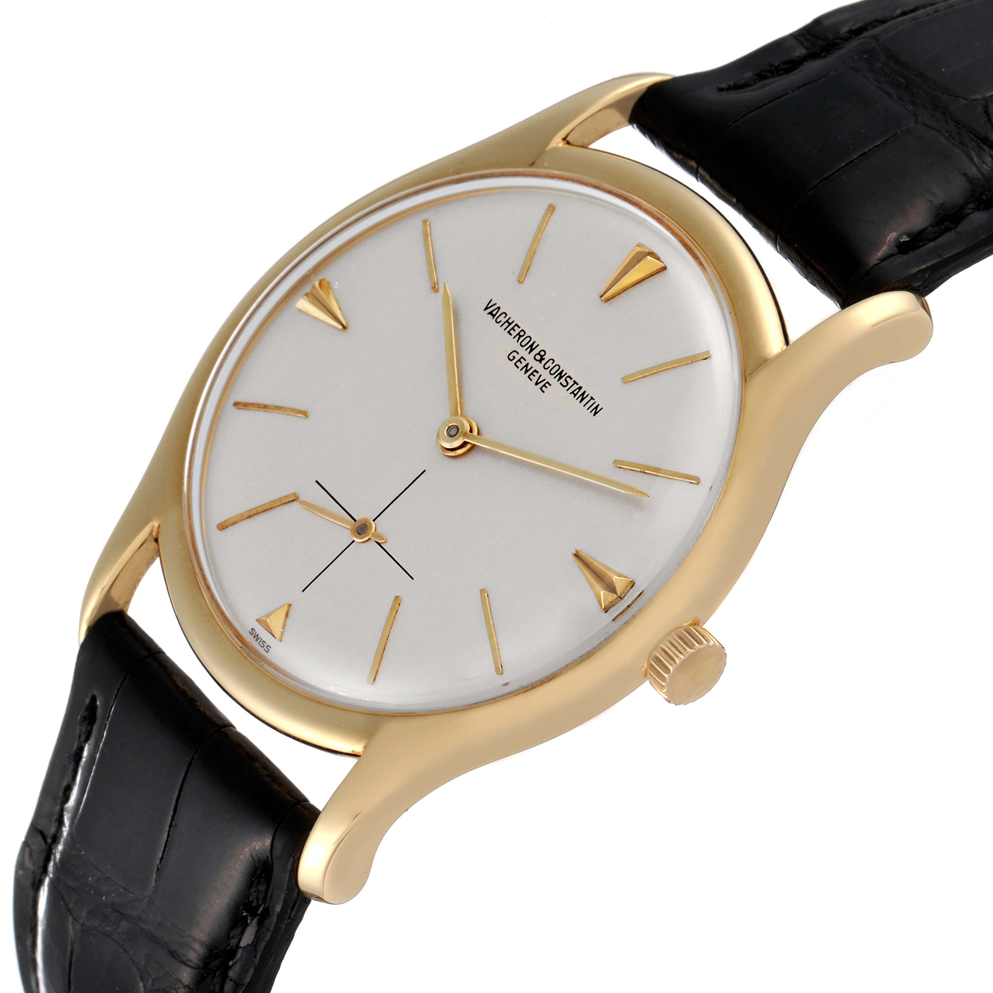 This Vintage Vacheron Constantin watch is angled from the top and right, showing the gold casing, crown, face, and black leather strap.