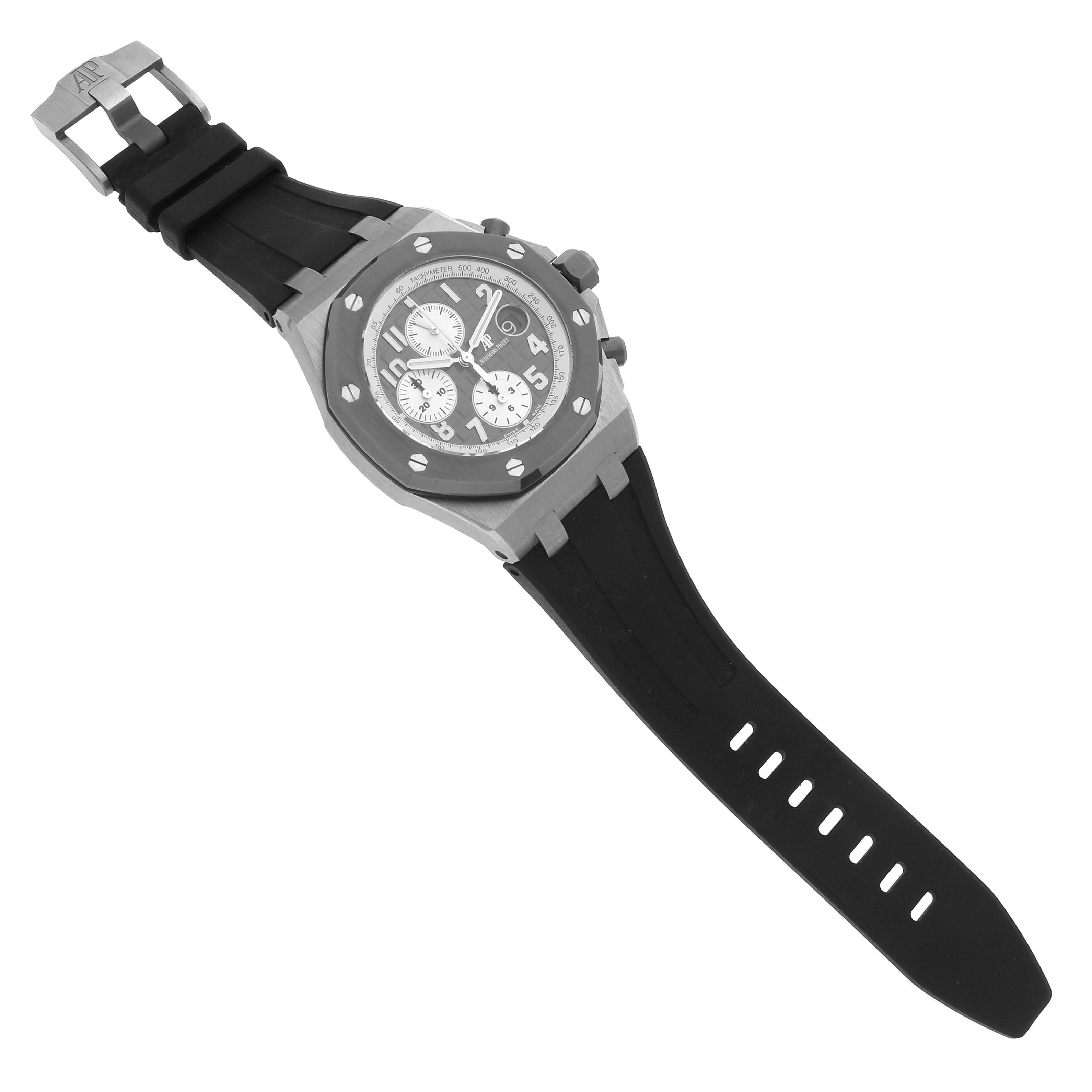 The Audemars Piguet Royal Oak Offshore 26470IO.OO.A006CA.01 Men
s Titanium Grey Dial 26470IO.OO.A006CA.01 Men
s Titanium Grey Dial watch is shown at an angled top view, revealing the face, bezel, strap, and clasp.