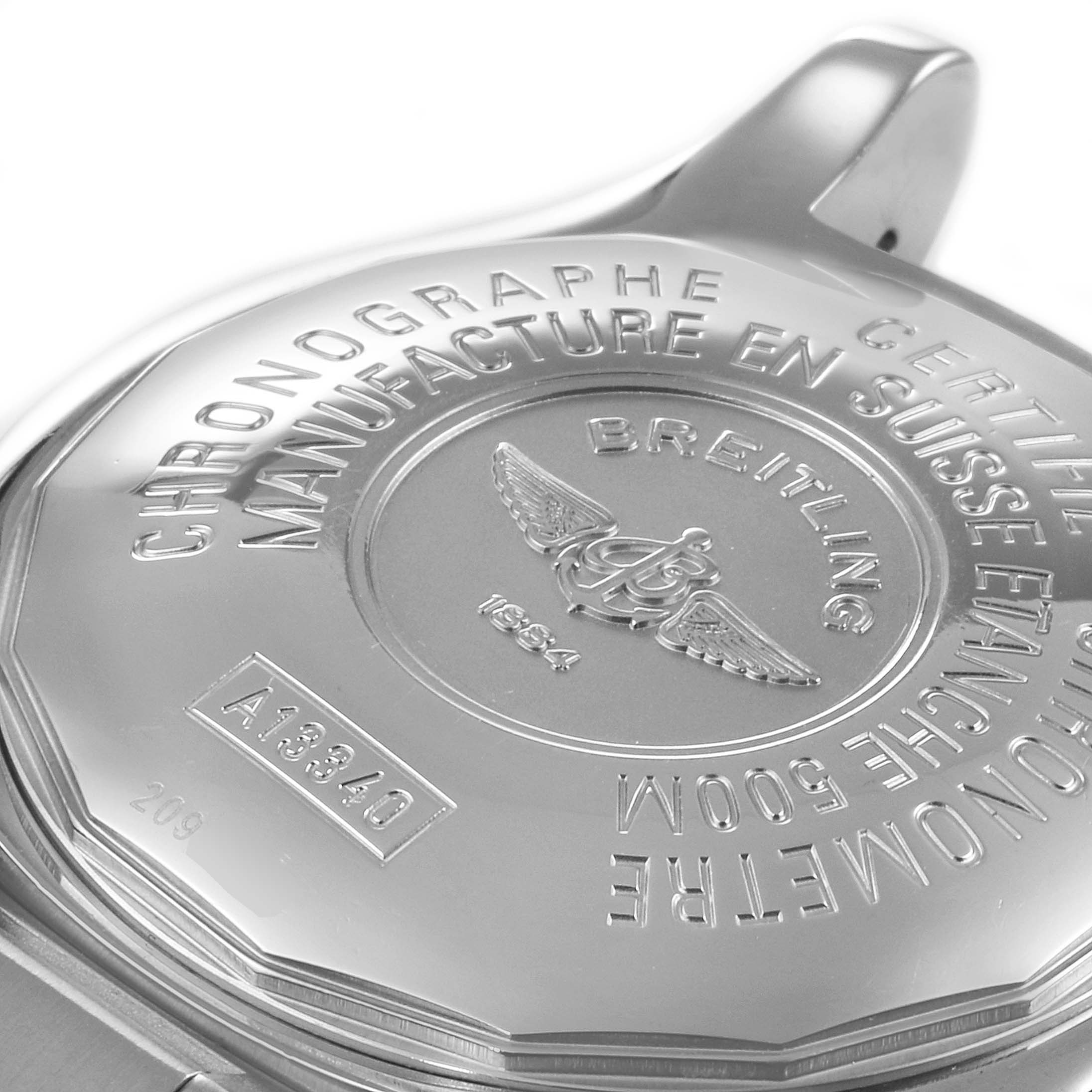 This image shows the case back of a Breitling Superocean A13340 Men's Stainless Steel Beige Dial A13340 Men's Stainless Steel Beige Dial watch, featuring engraved details and branding.