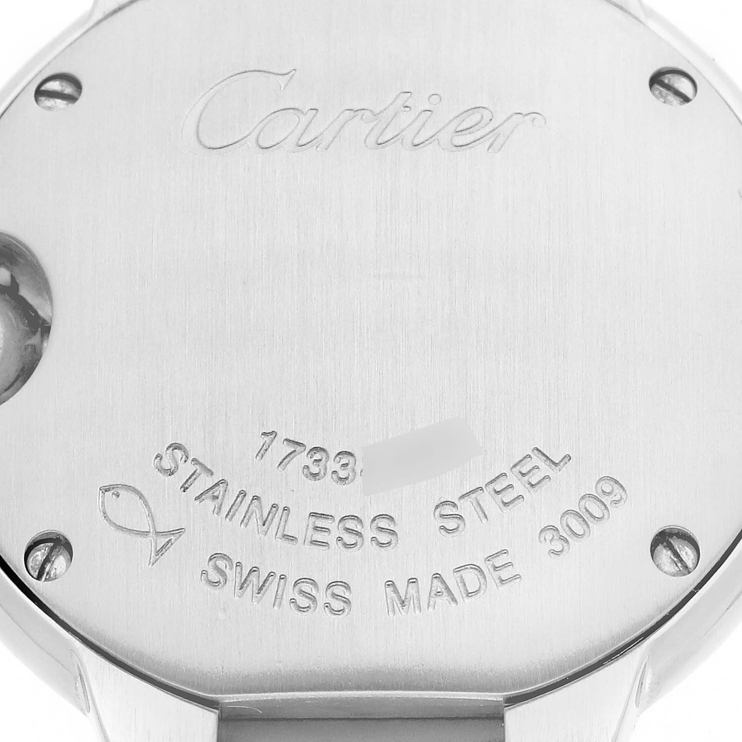 This image shows the back of the Cartier Ballon Bleu 63096 Women
s Stainless Steel Silver Dial 63096 Women
s Stainless Steel Silver Dial watch with engravings indicating stainless steel and Swiss made.