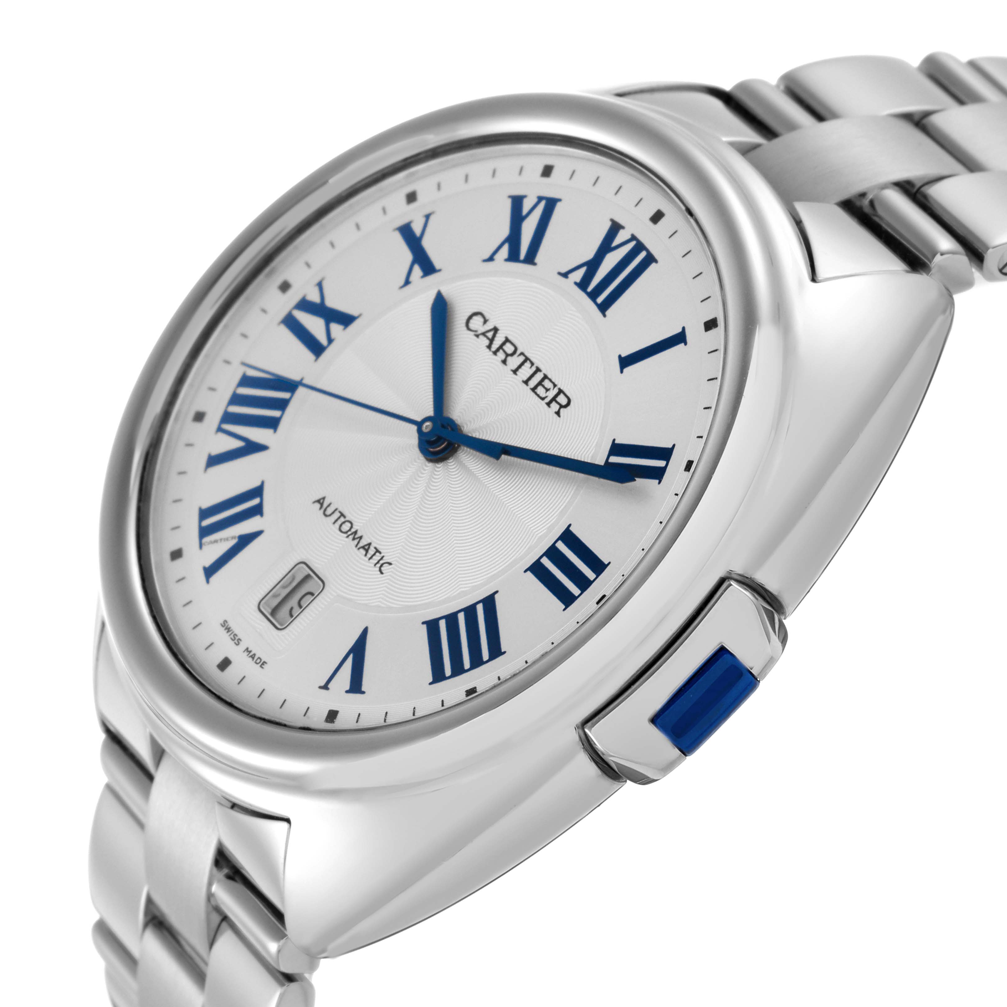 The Cartier Clé watch is shown at an angle highlighting the dial, Roman numerals, and the crown with a blue accent.