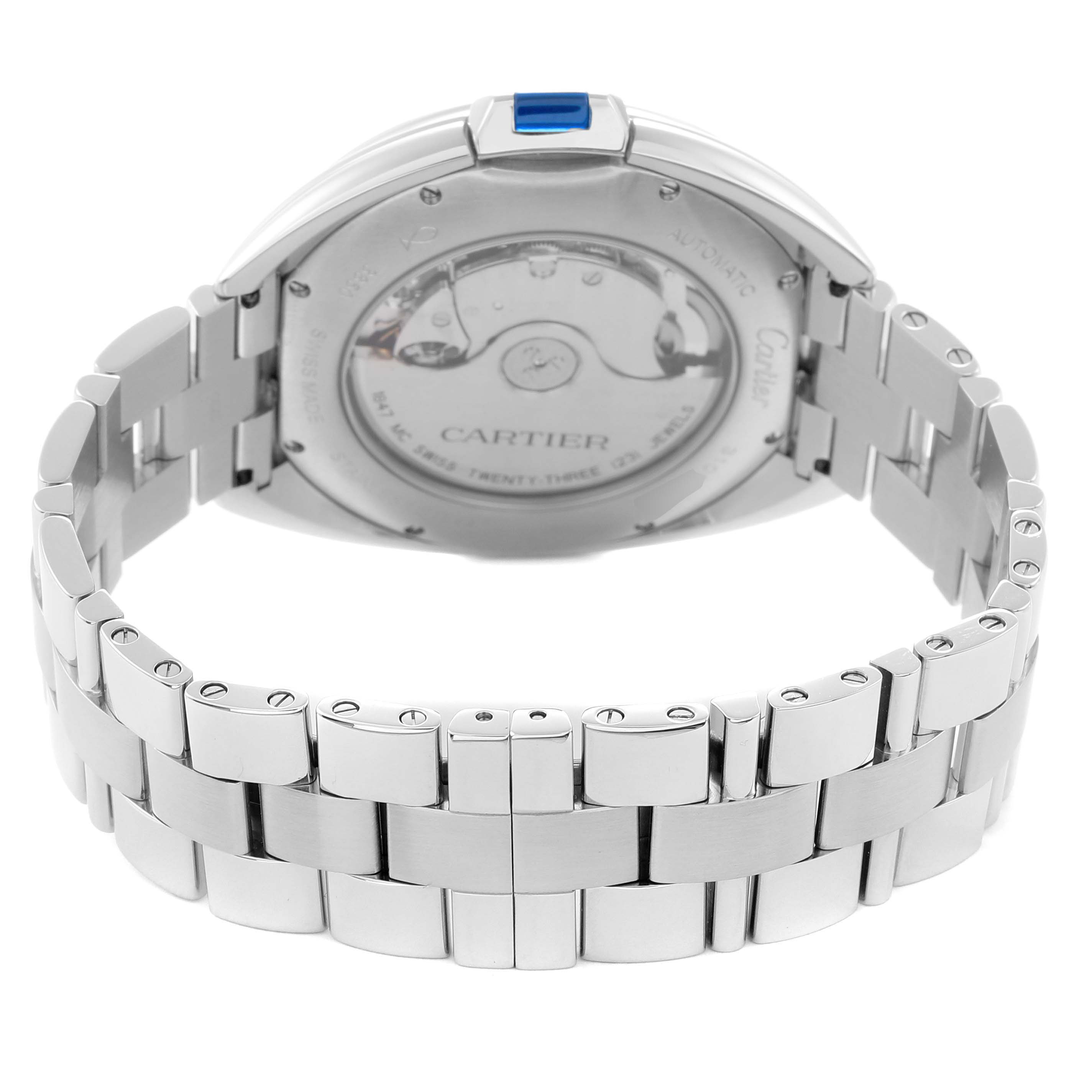 The image shows the back view of the Cartier Clé watch, highlighting the case back and stainless steel bracelet.