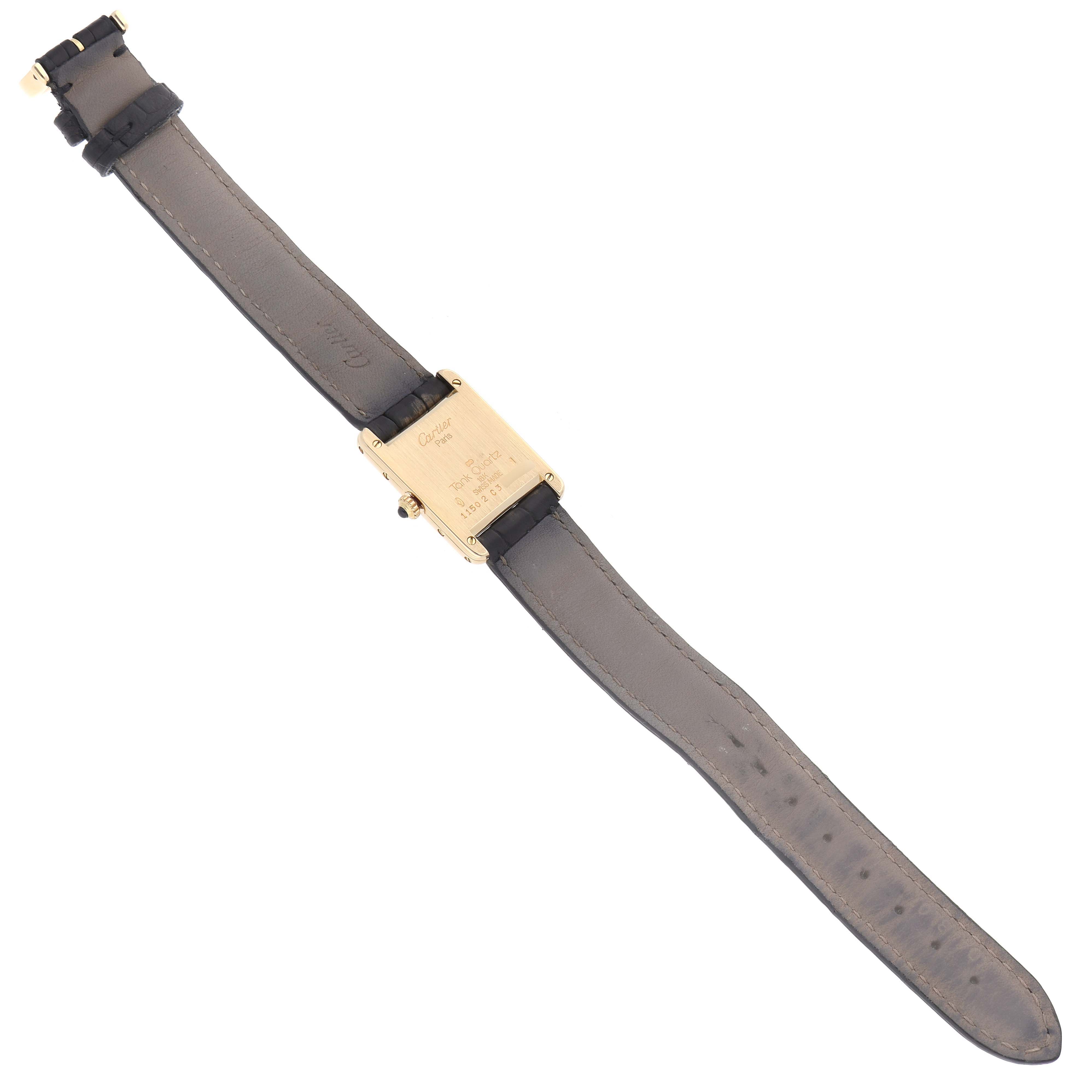 The Cartier Tank Classic 1150 Women
s Yellow Gold Silver Dial 1150 Women
s Yellow Gold Silver Dial watch is shown from the back, displaying its case and leather strap.