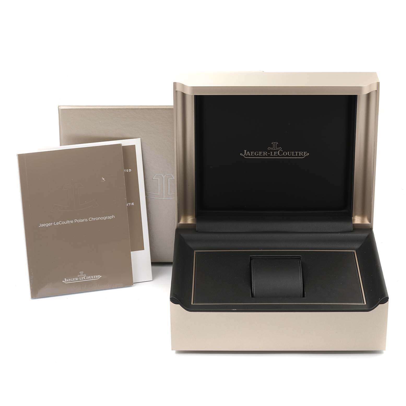 This image shows an open watch box for the Jaeger-LeCoultre Polaris model, with accompanying documentation nearby.