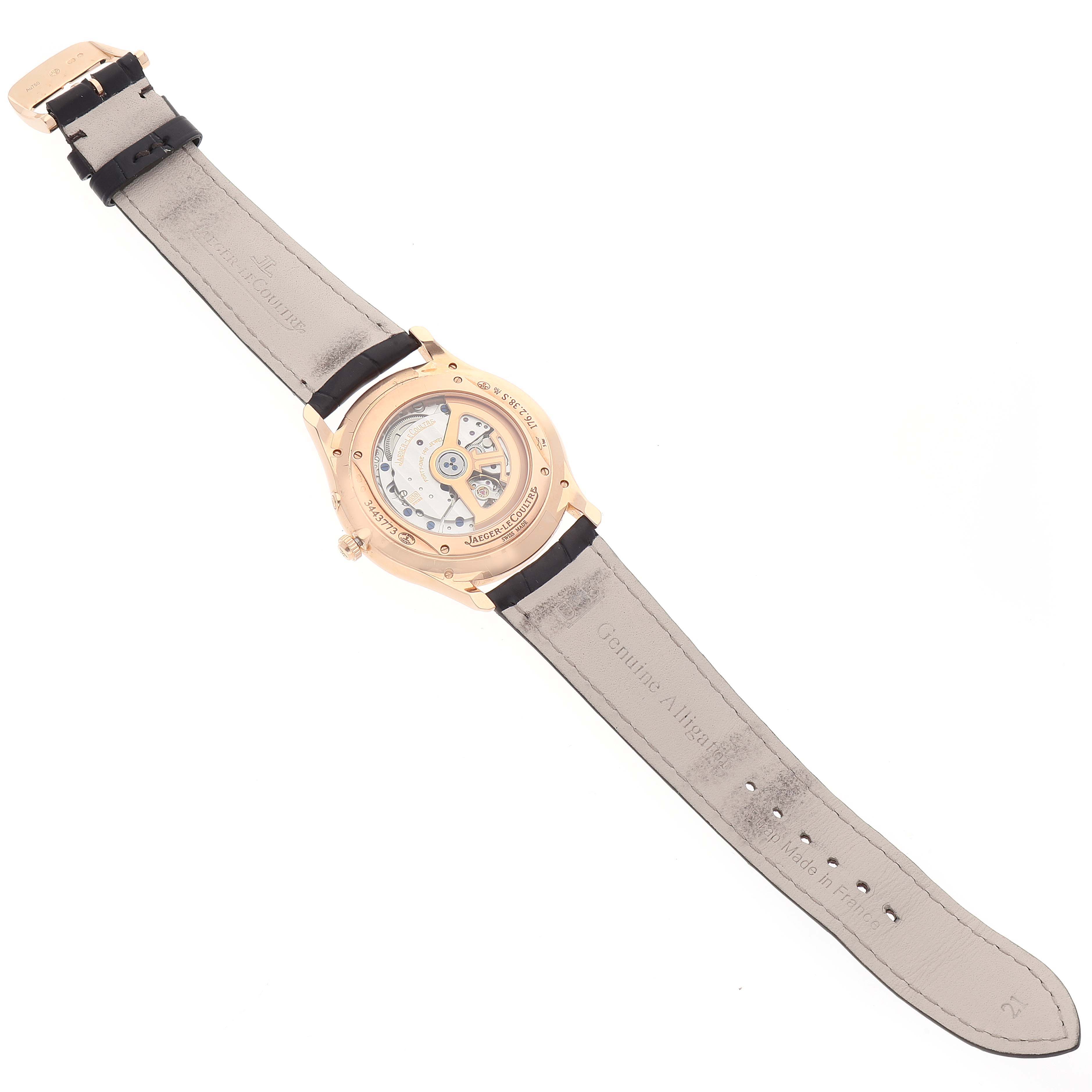 The image shows the back view of a Jaeger LeCoultre Master Q1372520 Men's Rose Gold Silver Dial Q1372520 Men's Rose Gold Silver Dial model watch, highlighting its movement and leather strap.