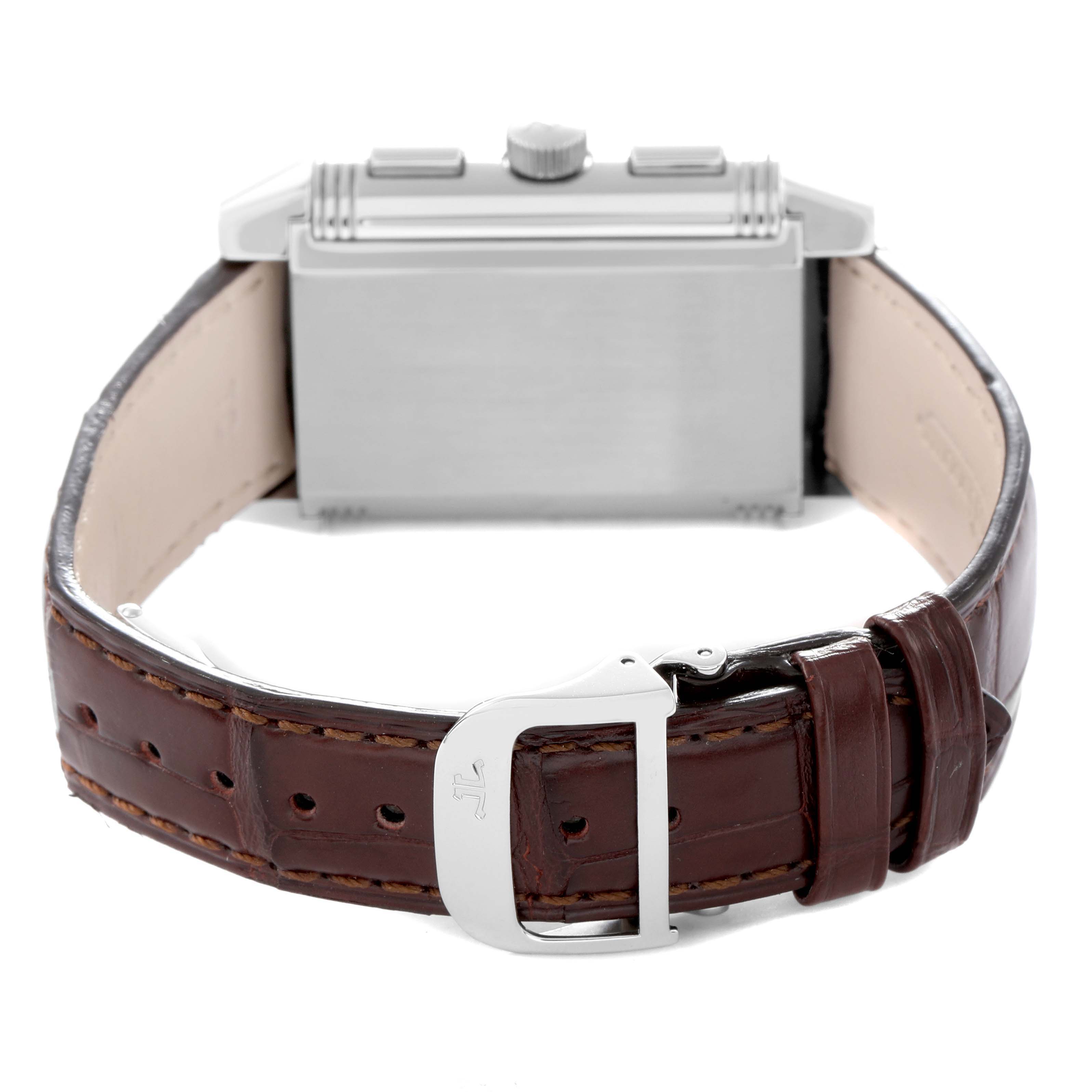 The Jaeger-LeCoultre Reverso watch is shown from the back, highlighting the case, strap, and buckle.