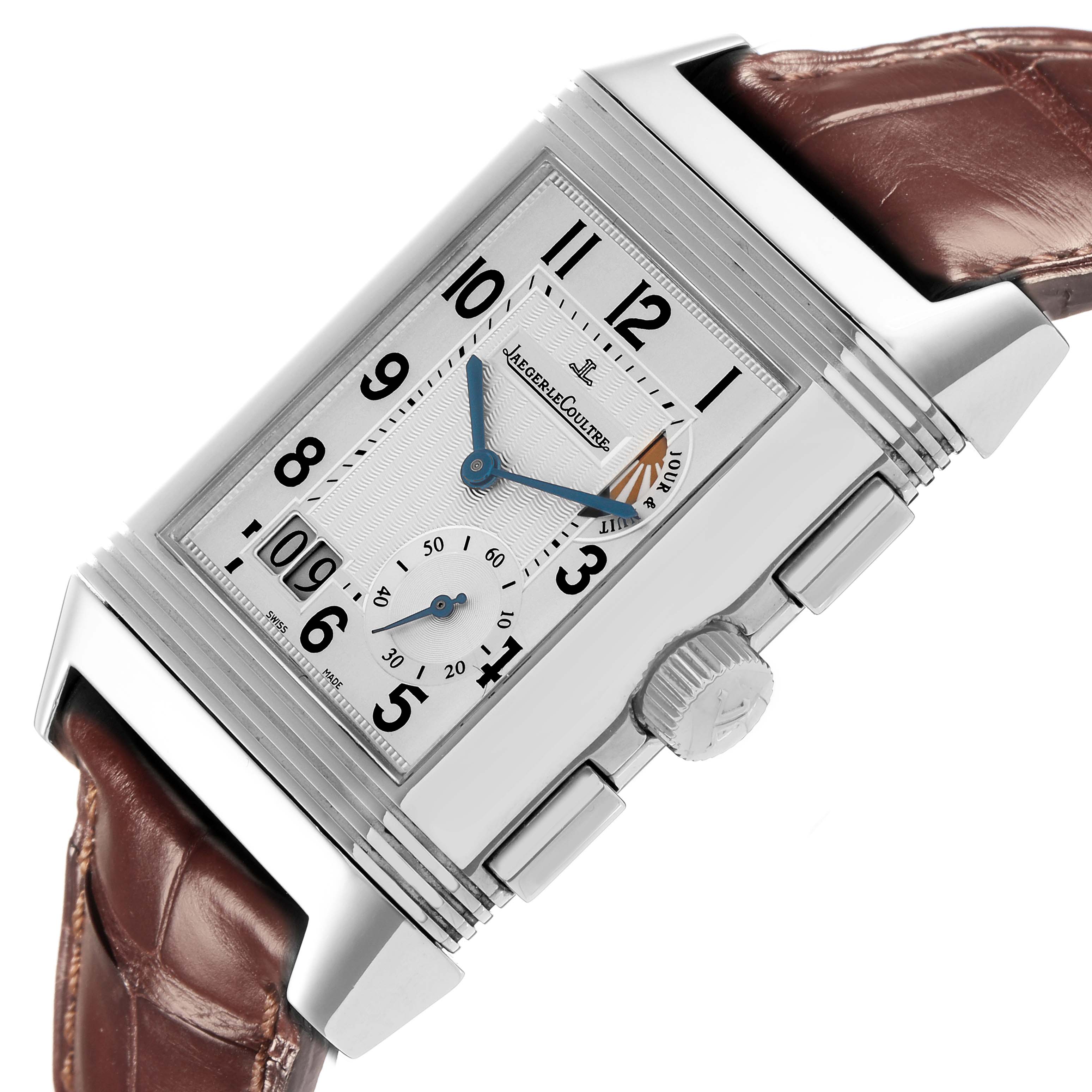 The Jaeger-LeCoultre Reverso watch is shown at an angled side view, highlighting the dial, crown, and strap connection.