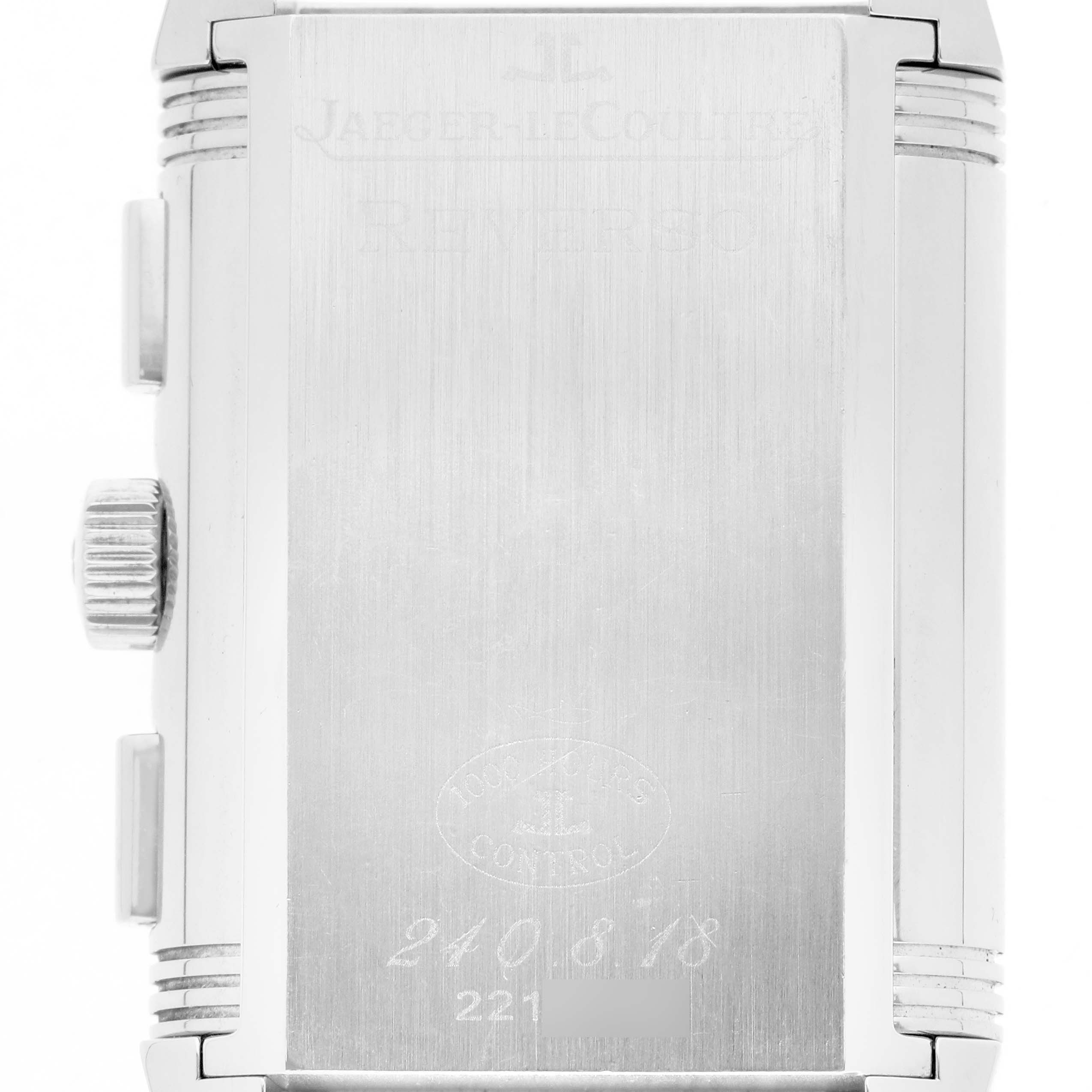 The image shows the back side of the Jaeger-LeCoultre Reverso watch, highlighting the case and crown.