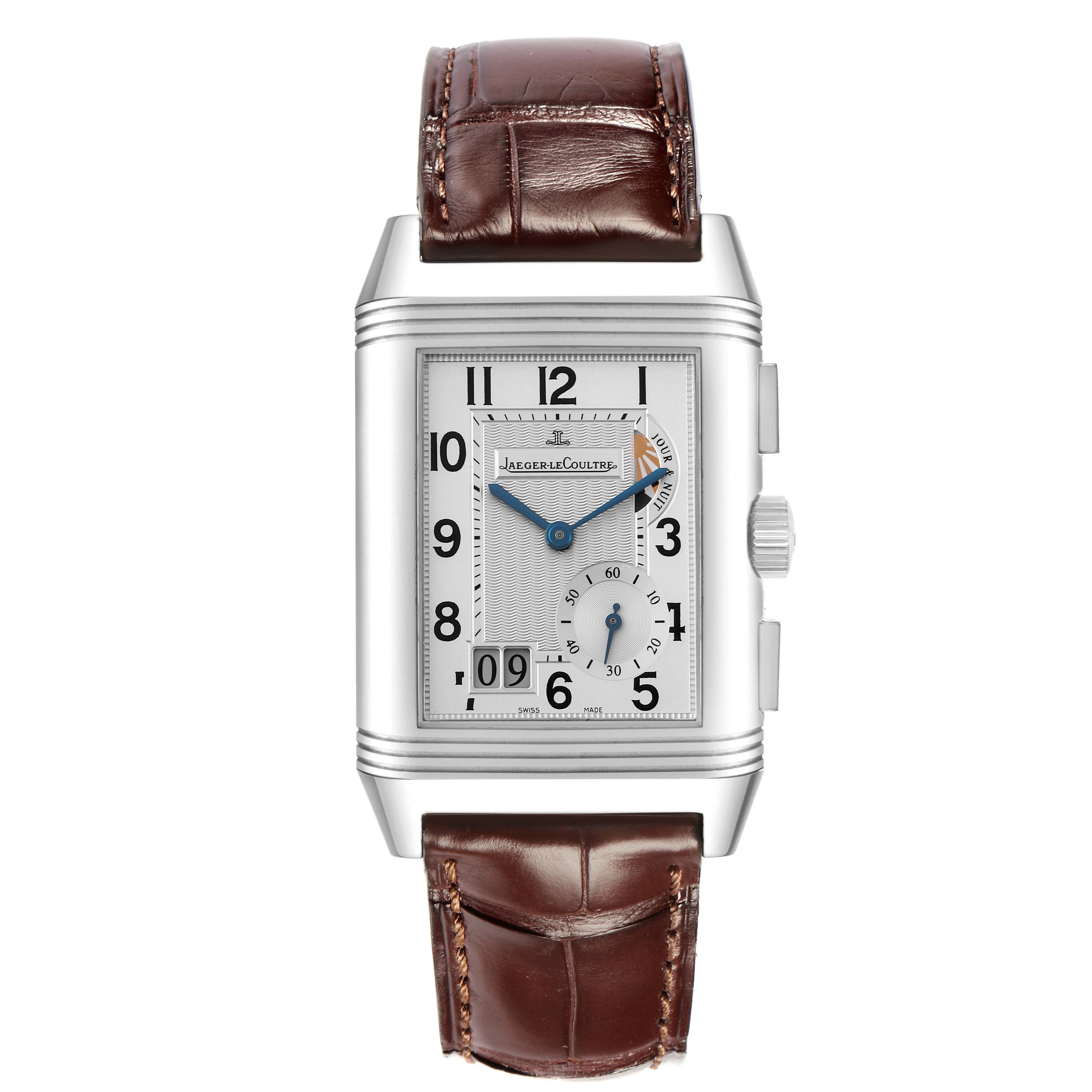 The Jaeger LeCoultre Reverso Q3028420 Men's Stainless Steel Silver Dial Q3028420 Men's Stainless Steel Silver Dial model is shown from the front, displaying its rectangular dial, hour markers, and brown leather strap.
