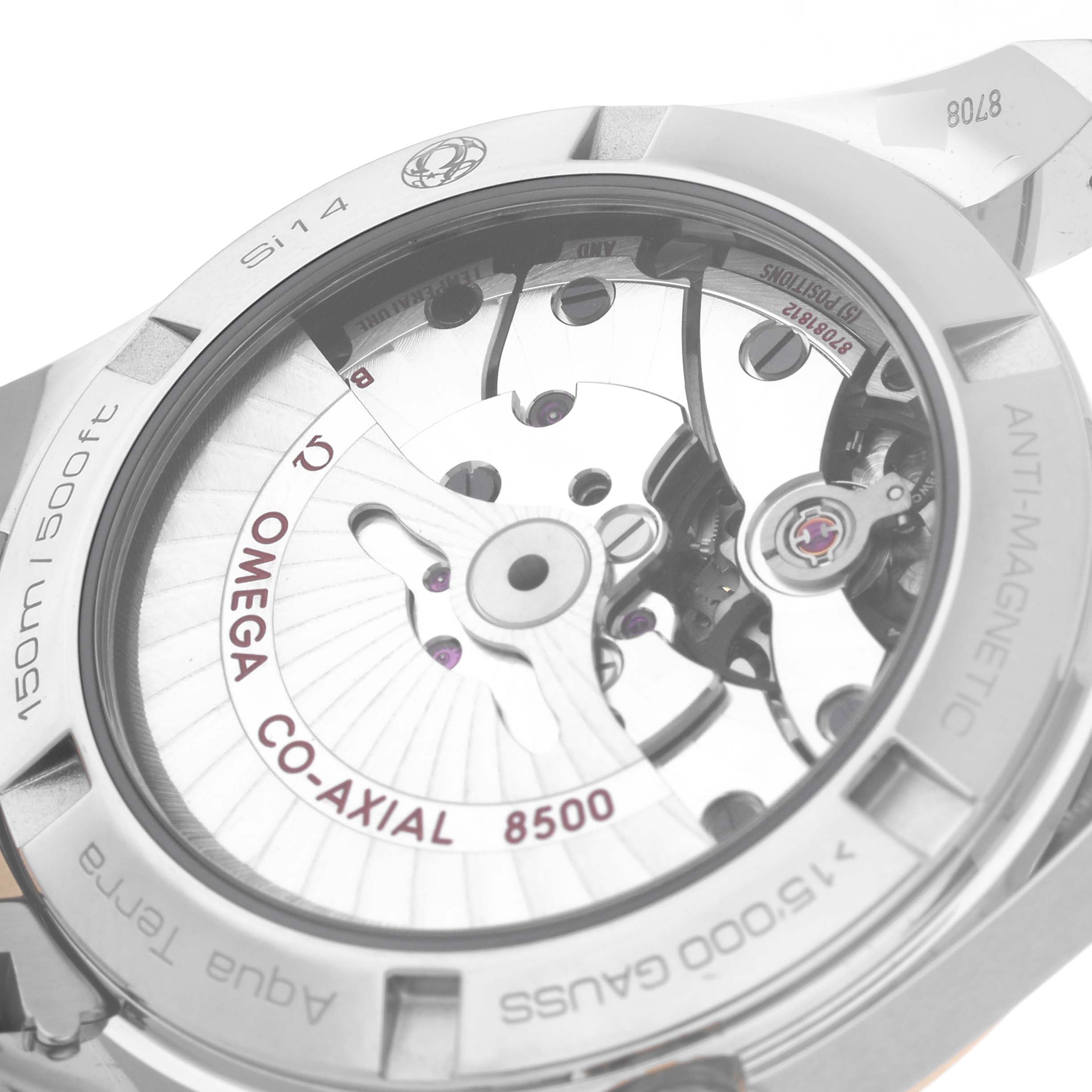 The image shows the back of an Omega Aqua Terra 231.20.39.21.08.001 Men's Steel and Gold (two tone) Champagne Dial 231.20.39.21.08.001 Men's Steel and Gold (two tone) Champagne Dial watch, highlighting its Co-Axial 8500 movement and anti-magnetic features.