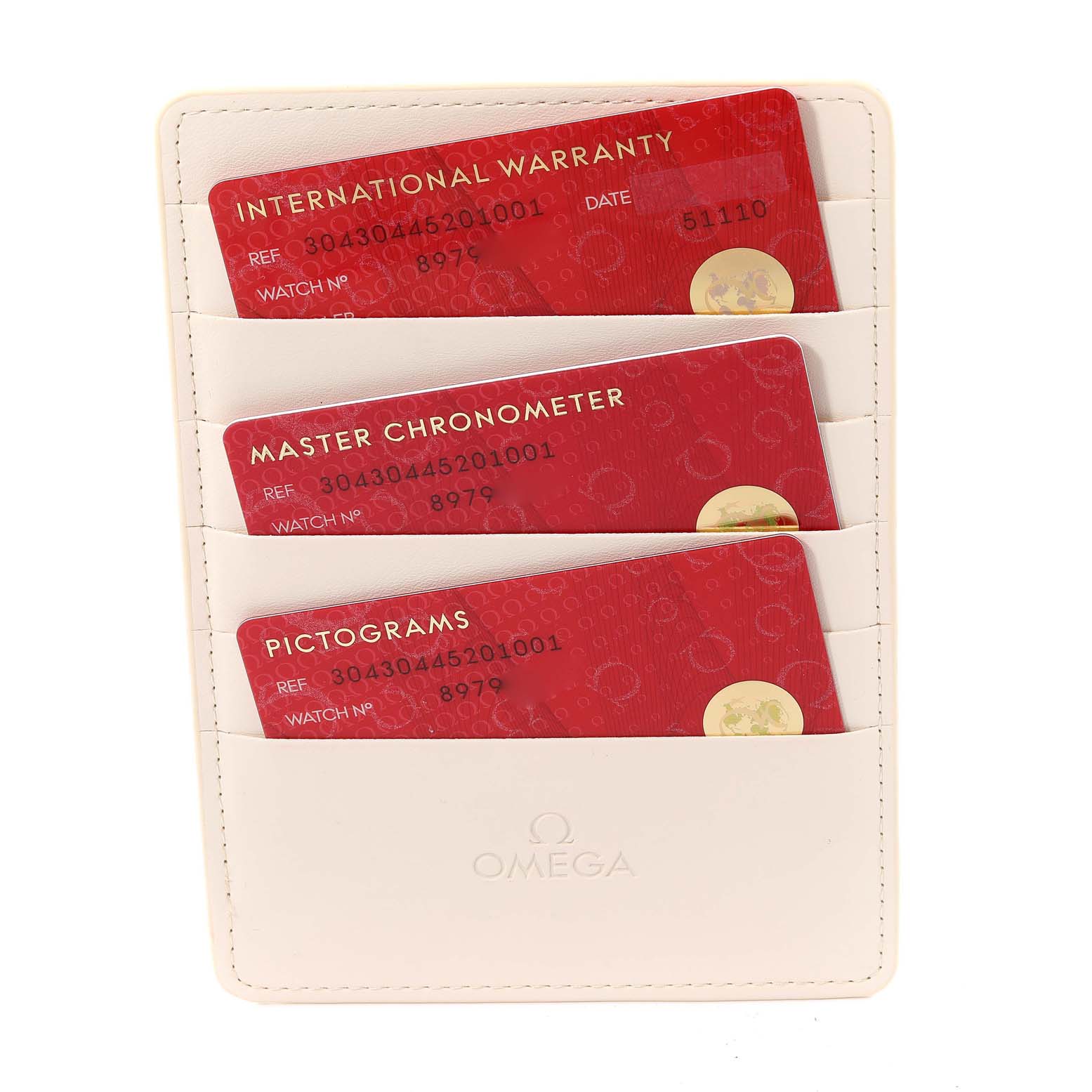 The image shows warranty, chronometer, and pictogram cards for an Omega Speedmaster 304.30.44.52.01.001 Men
s Stainless Steel Black Dial 304.30.44.52.01.001 Men
s Stainless Steel Black Dial watch in a white cardholder.