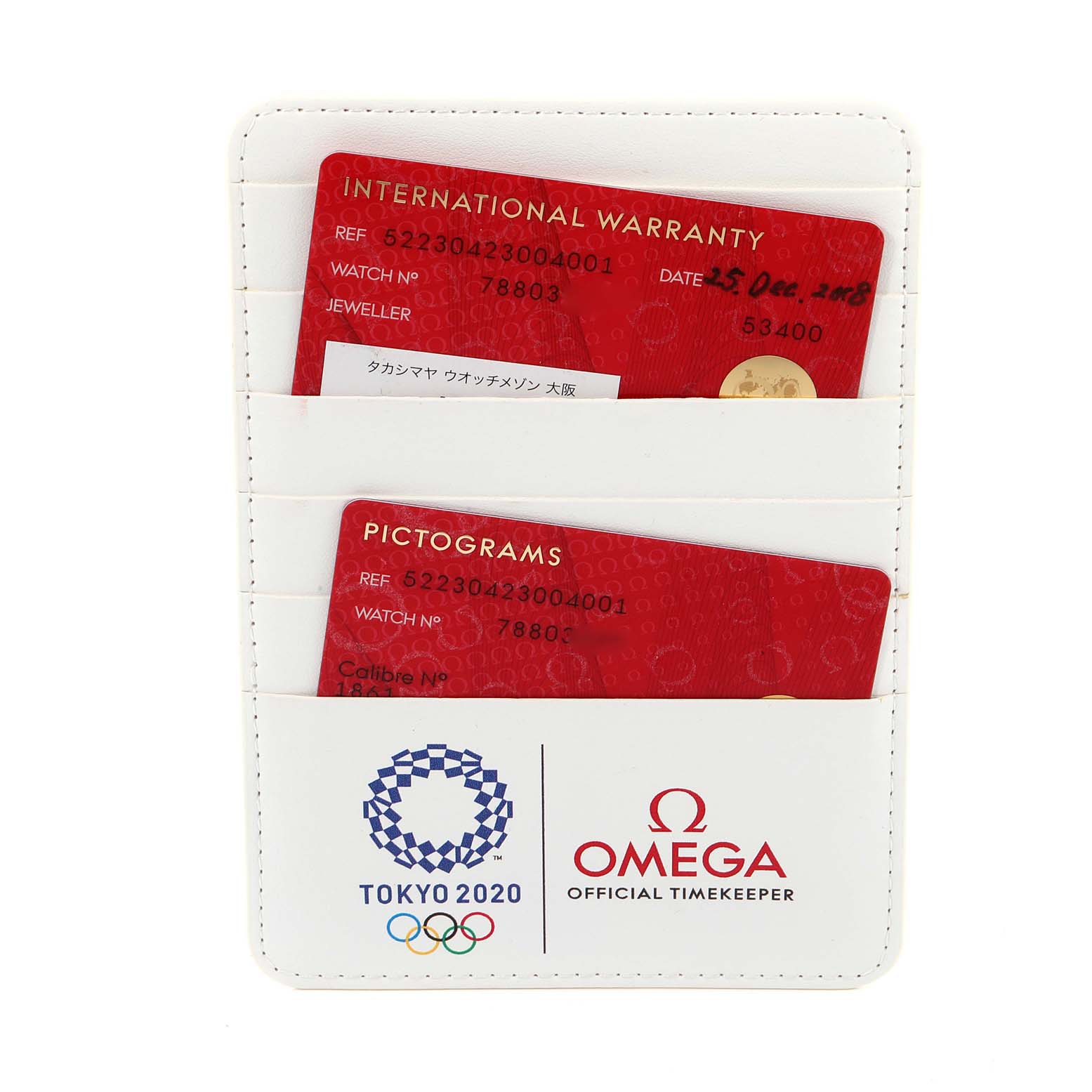 The image shows a white cardholder with red International Warranty and Pictograms cards for an Omega Speedmaster 522.30.42.30.04.001 Men's Stainless Steel White Dial 522.30.42.30.04.001 Men's Stainless Steel White Dial watch.
