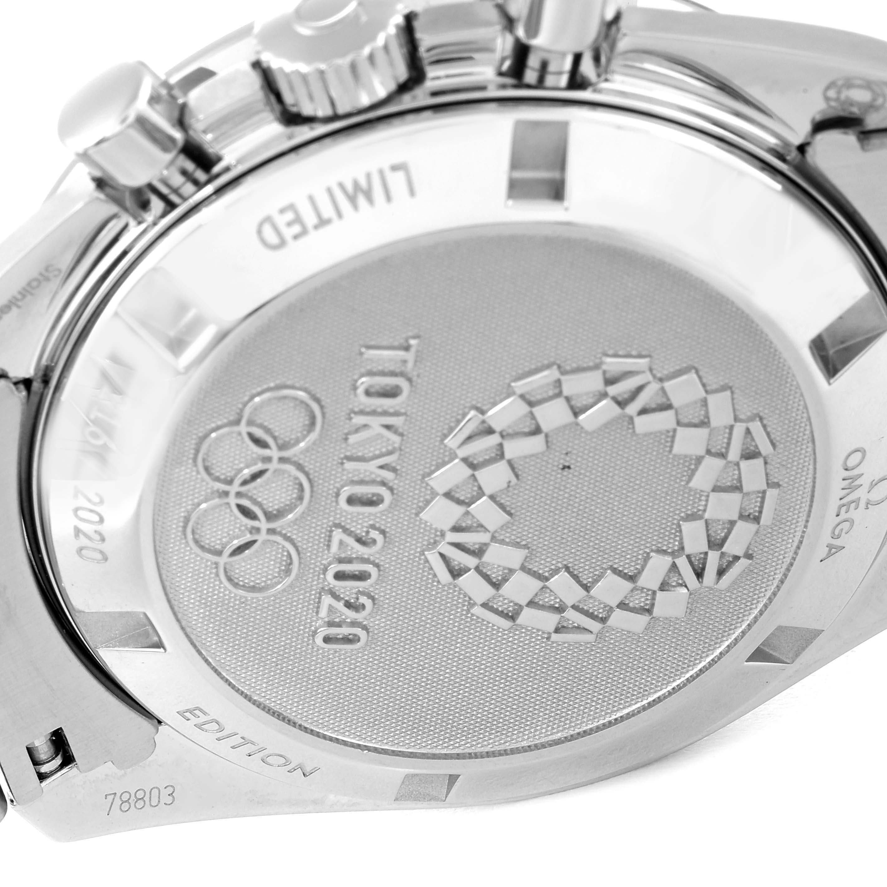 The image shows the back casing of an Omega Speedmaster 522.30.42.30.04.001 Men's Stainless Steel White Dial 522.30.42.30.04.001 Men's Stainless Steel White Dial watch, featuring the Tokyo 2020 logo and limited edition inscription.