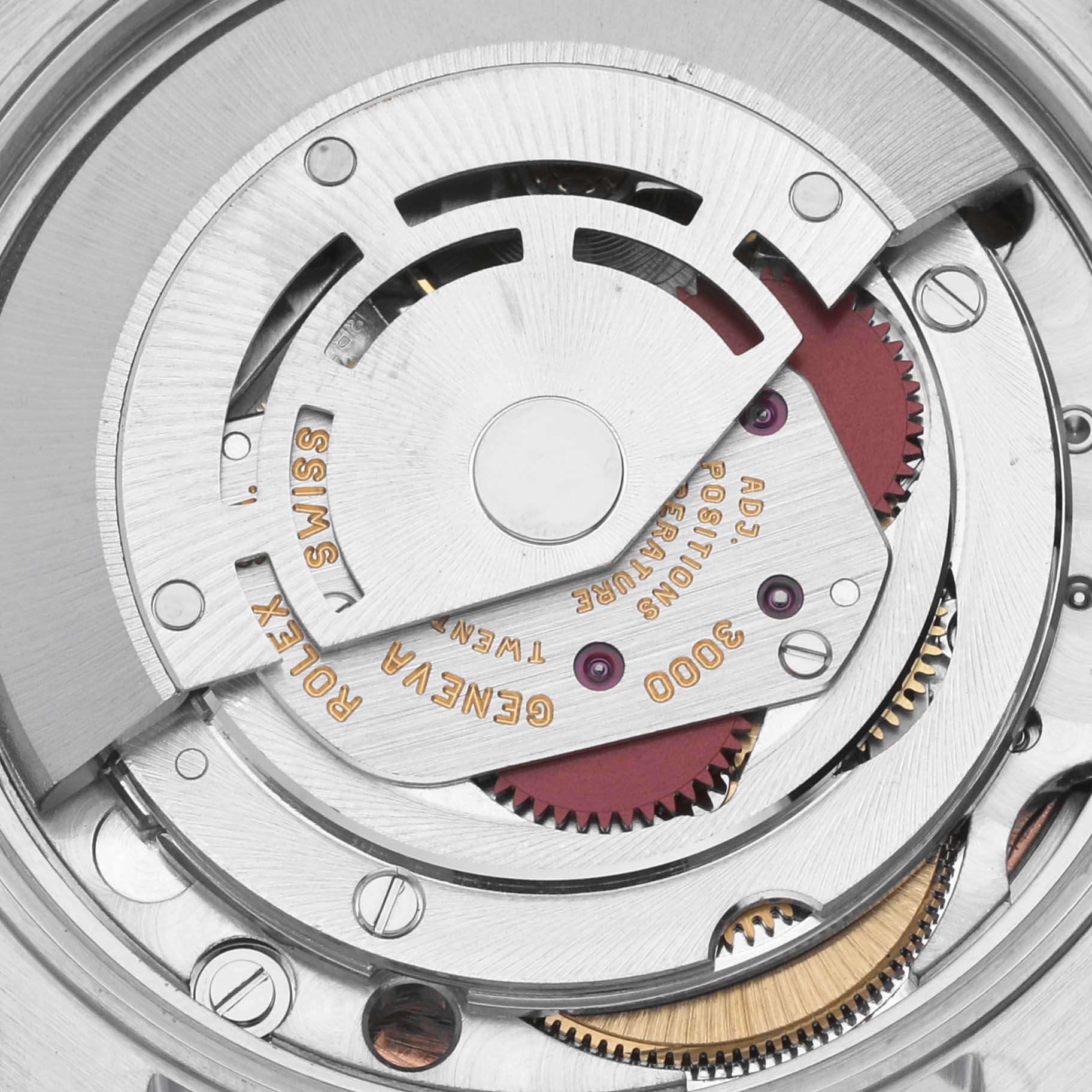 The image shows a close-up view of the movement of a Rolex Air-King 14010 Men's Stainless Steel Pink Dial 14010 Men's Stainless Steel Pink Dial watch, highlighting its intricate mechanical components.