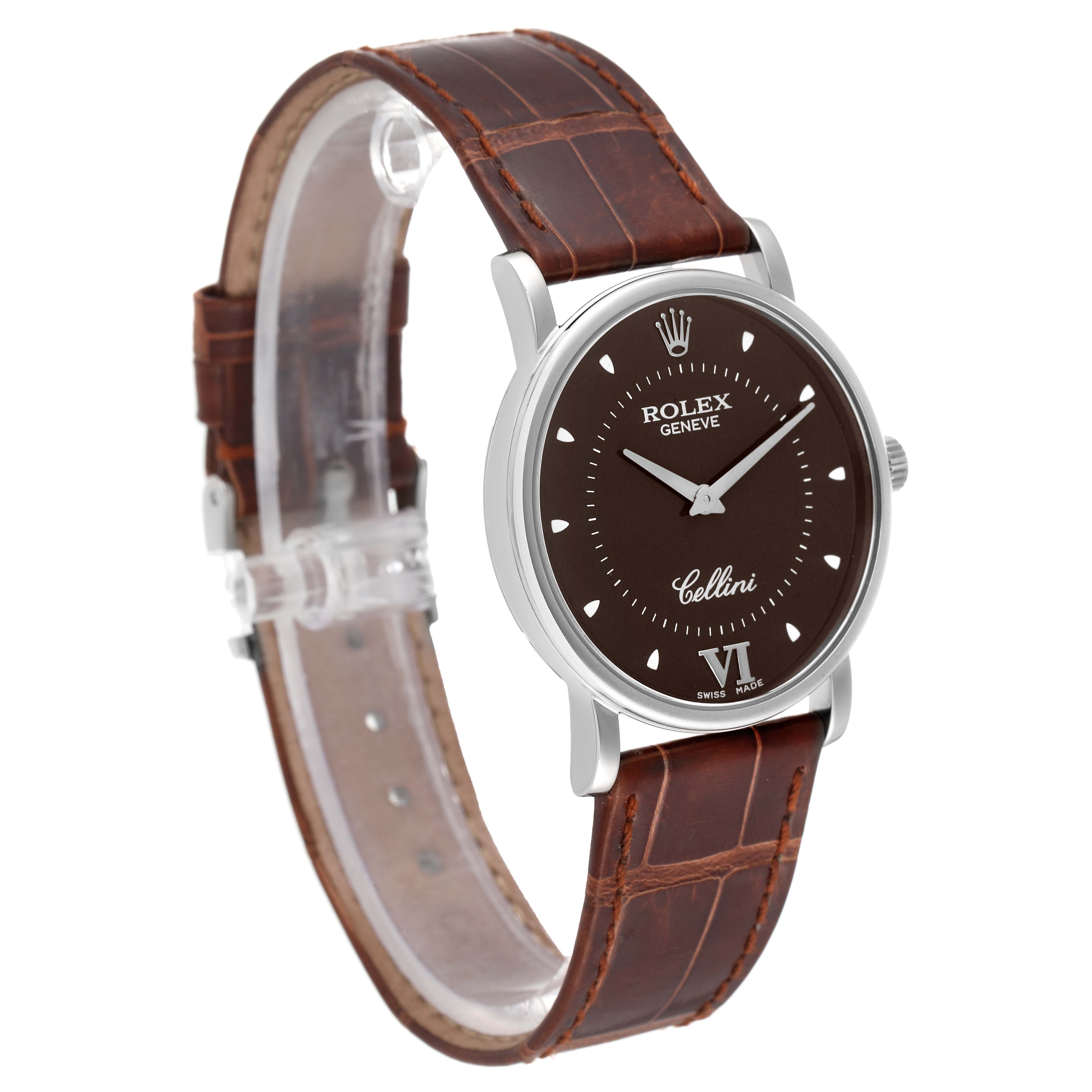 The Rolex Cellini 5115 Men's White Gold Brown Dial 5115 Men's White Gold Brown Dial model watch is shown at a slight angle, highlighting its brown dial, leather strap, and silver bezel.