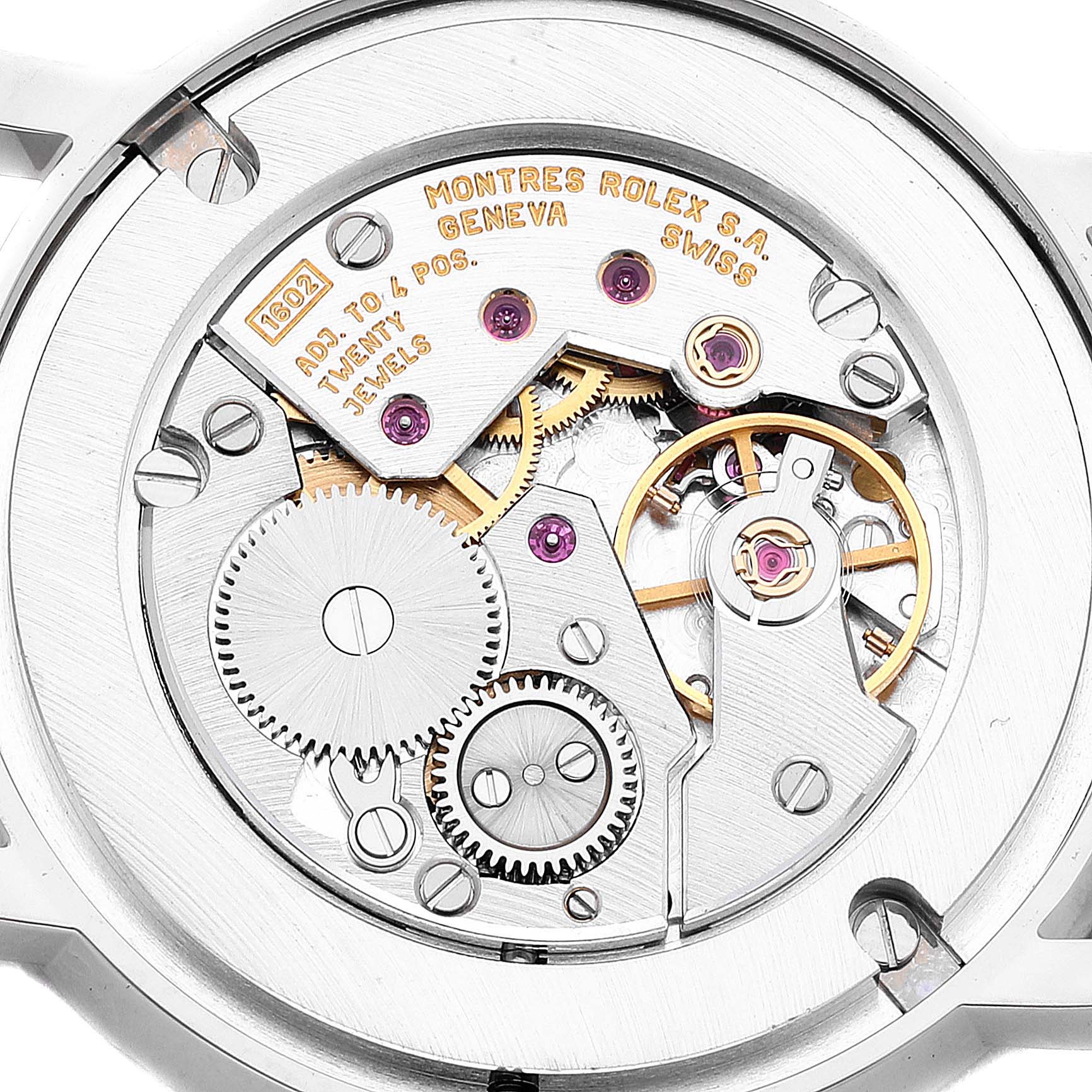 This image shows the intricate mechanical movement of a Rolex Cellini 5115 Men's White Gold Brown Dial 5115 Men's White Gold Brown Dial watch, focusing on the gears and internal components.