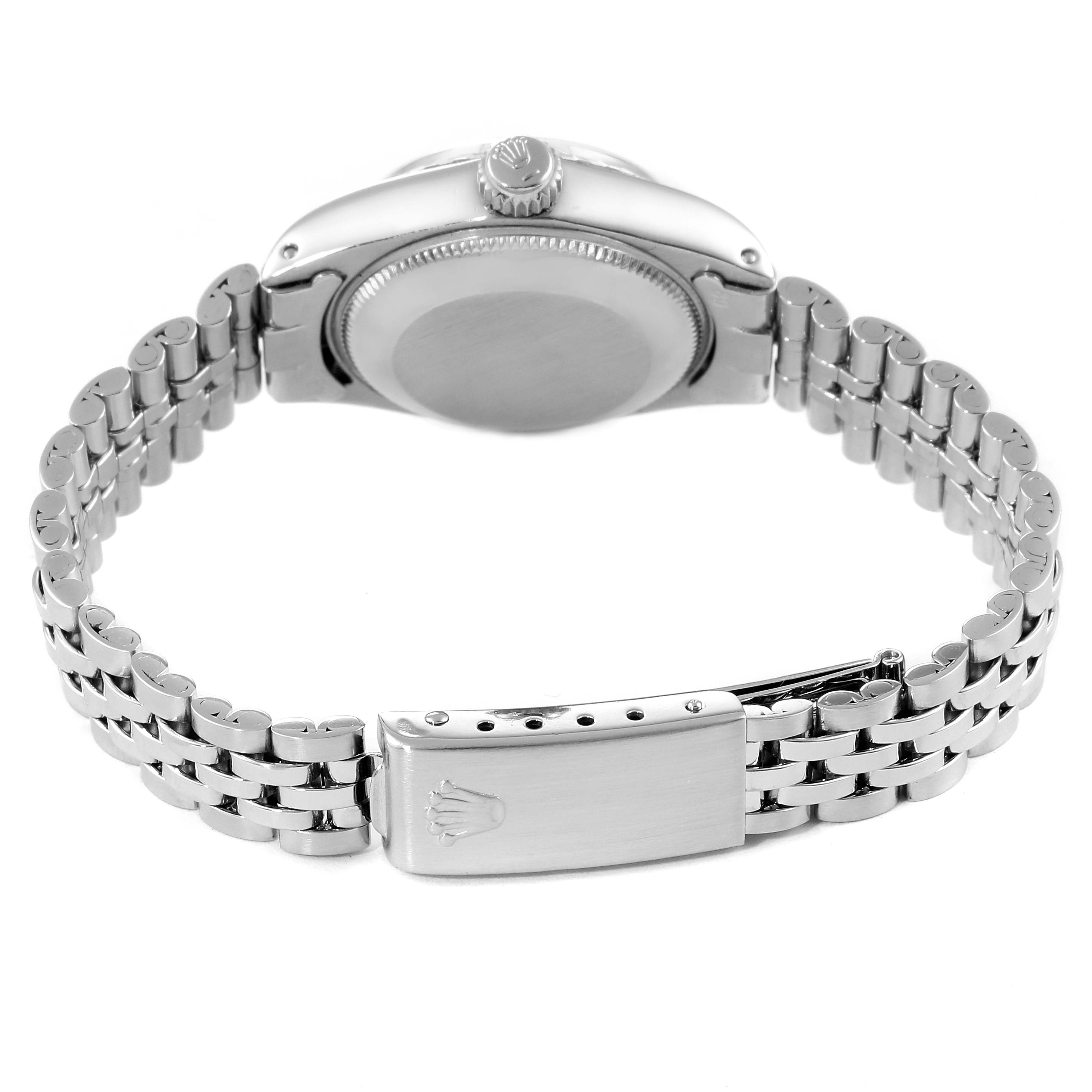 The image shows the back view of the Rolex Date 6924 Women's Stainless Steel Silver Dial 6924 Women's Stainless Steel Silver Dial model, highlighting the case back, crown, and bracelet clasp.