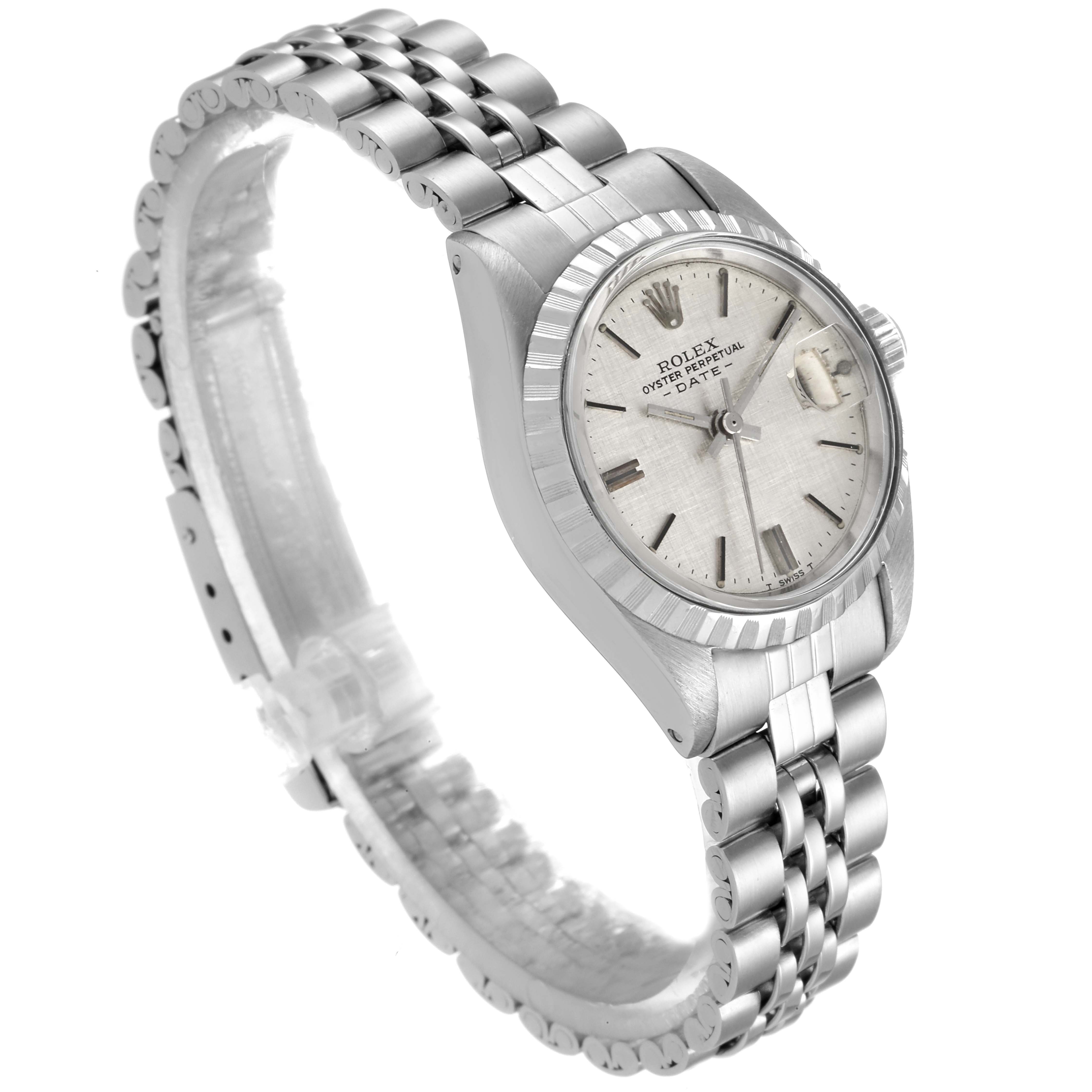 The image shows a Rolex Date 6924 Women's Stainless Steel Silver Dial 6924 Women's Stainless Steel Silver Dial model watch at a slight angled view, displaying the face, bezel, and part of the bracelet.