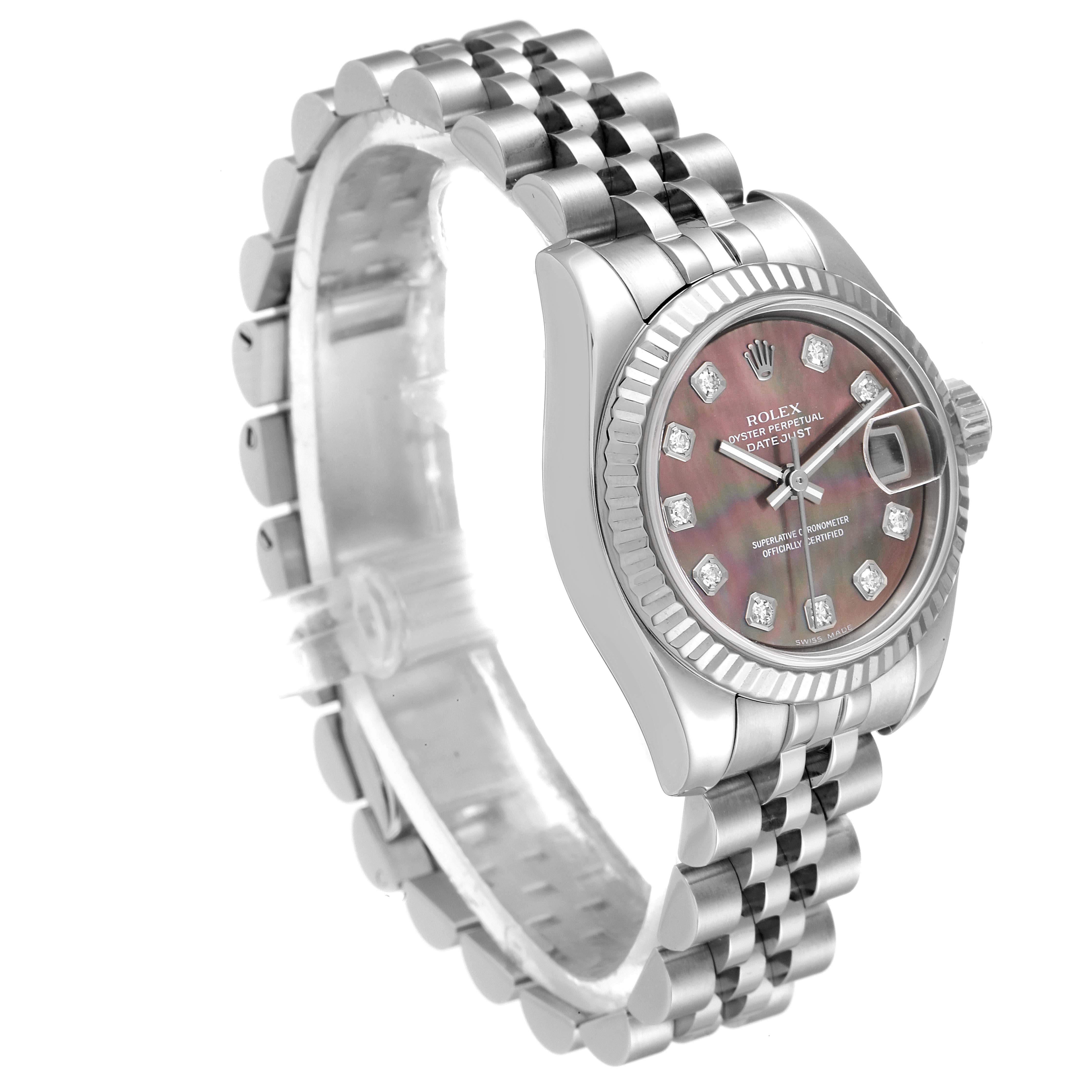 The image shows a Rolex Datejust 179174 Women
s Stainless Steel Mother of Pearl Dial 179174 Women
s Stainless Steel Mother of Pearl Dial watch at a side angle displaying the face, bracelet, and crown.