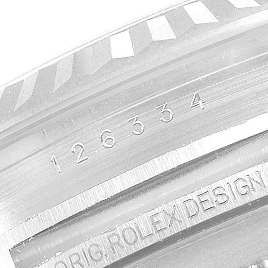 This image shows the case number and part of the bezel of the Rolex Datejust 41 126334 Men
s Stainless Steel Black Dial 126334 Men
s Stainless Steel Black Dial watch.