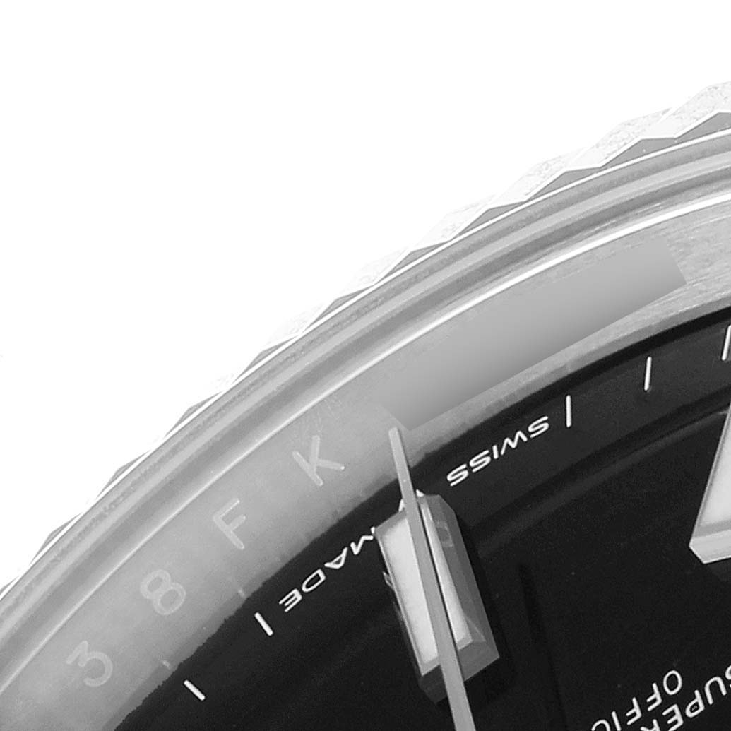 This close-up image shows the side and part of the dial of a Rolex Datejust 41 126334 Men
s Stainless Steel Black Dial 126334 Men
s Stainless Steel Black Dial watch, highlighting the bezel, hour markers, and hands.