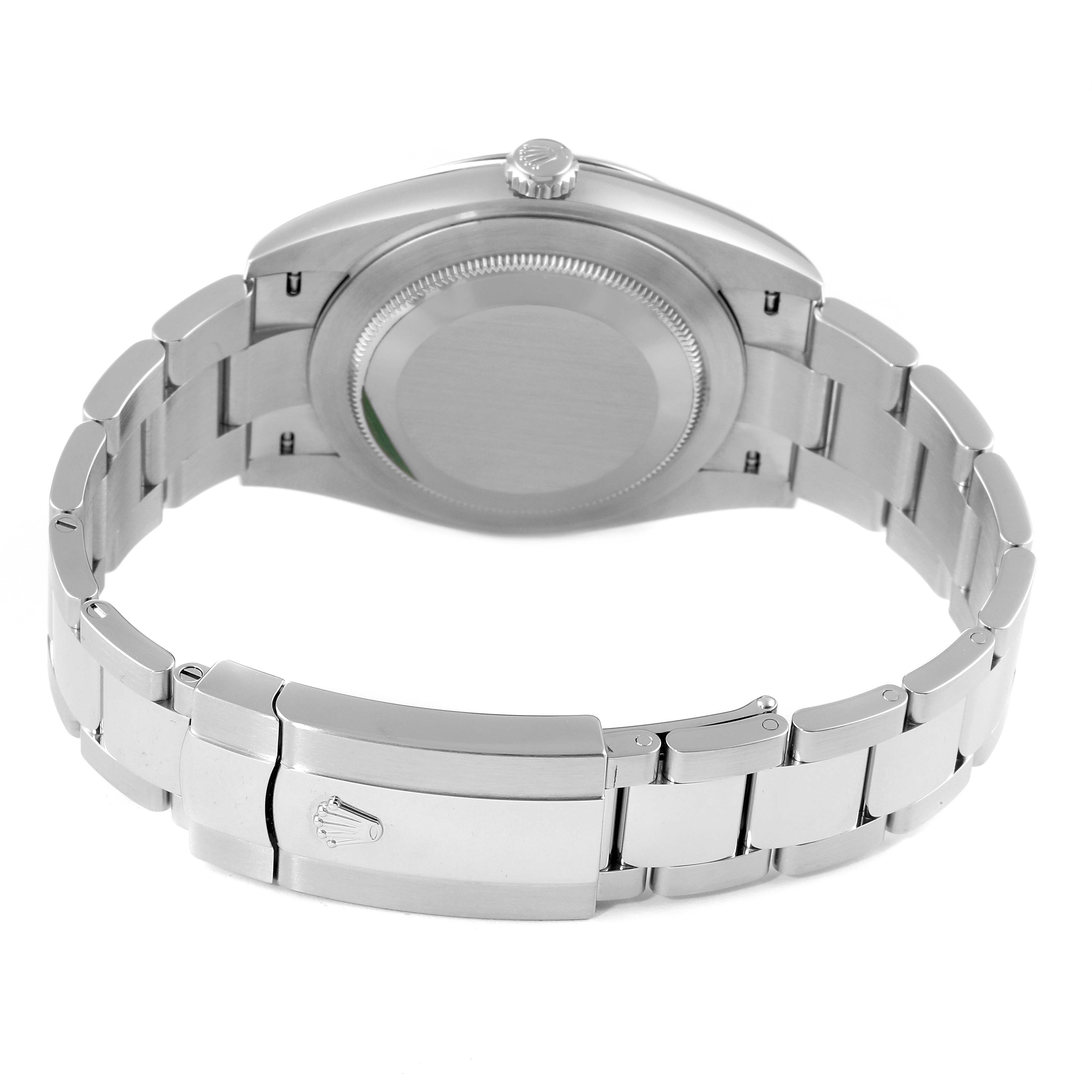 The image shows the back of a Rolex Datejust 41 126334 Men
s Stainless Steel Blue Dial 126334 Men
s Stainless Steel Blue Dial watch, focusing on the caseback and the bracelet clasp.