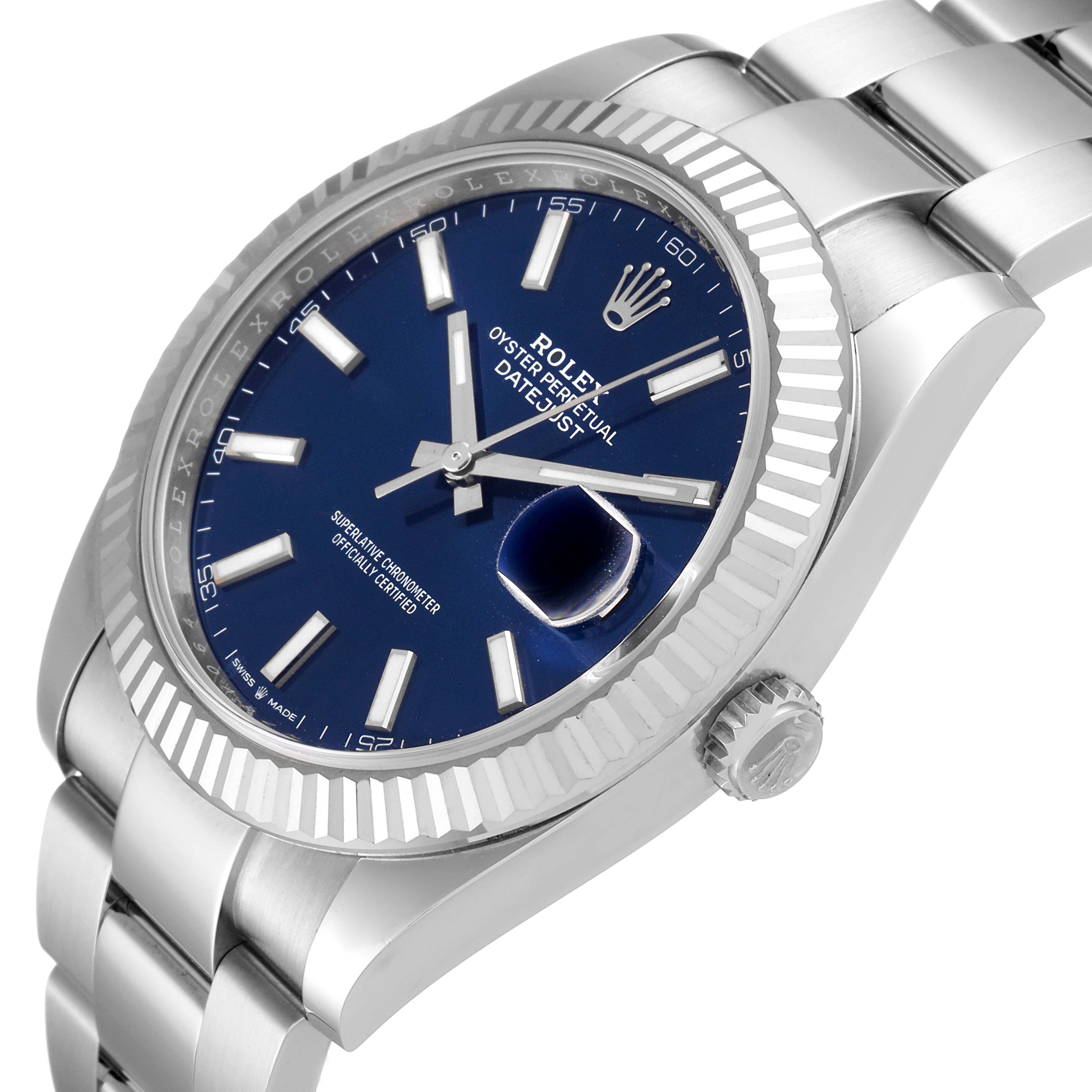 The Rolex Datejust 41 126334 Men
s Stainless Steel Blue Dial 126334 Men
s Stainless Steel Blue Dial watch is shown from a tilted side angle, highlighting its blue dial, fluted bezel, and part of the bracelet.