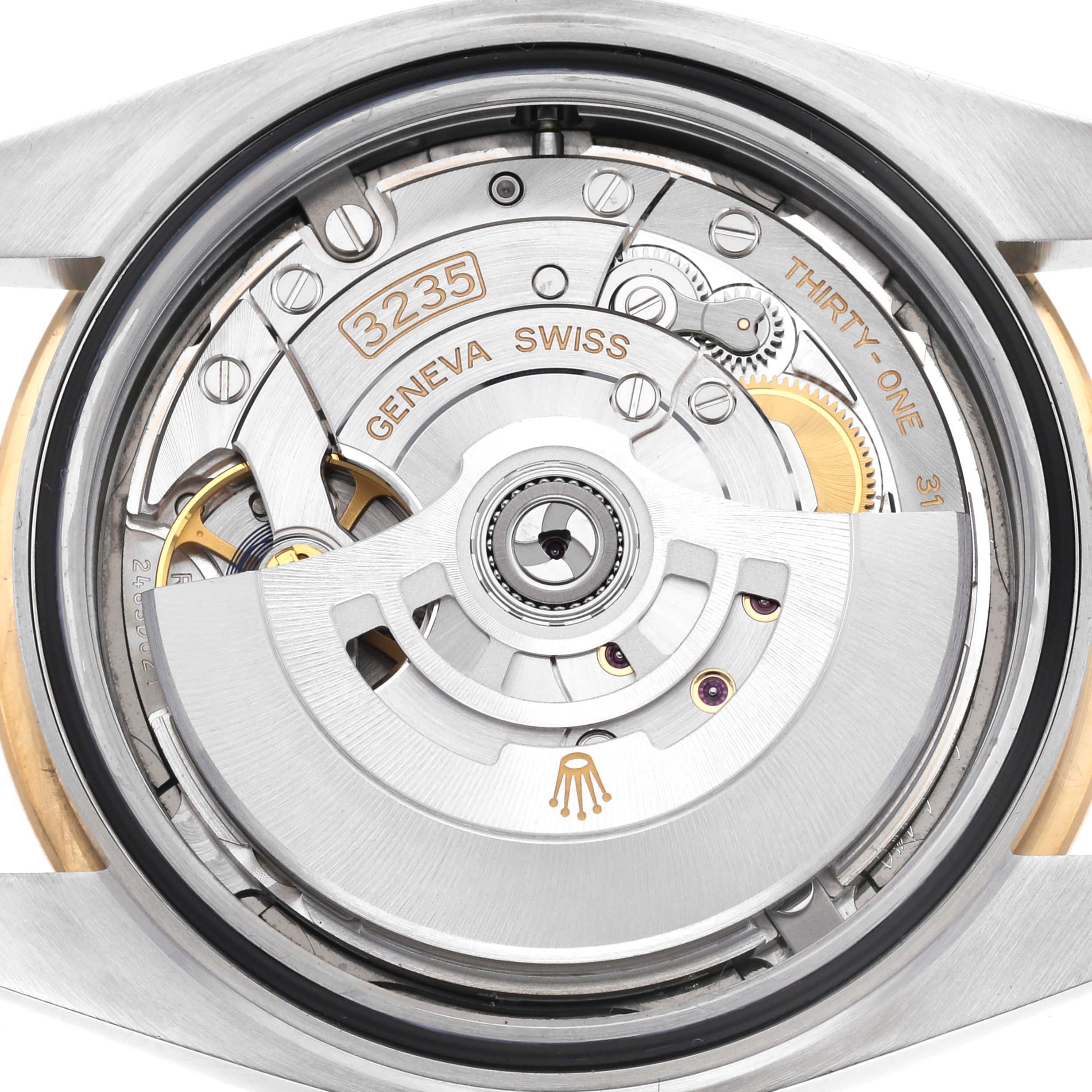 This image shows the movement and internal mechanism of a Rolex Datejust 41 126333 Men's Steel and Gold (two tone) Grey Dial 126333 Men's Steel and Gold (two tone) Grey Dial watch, viewed from the back.