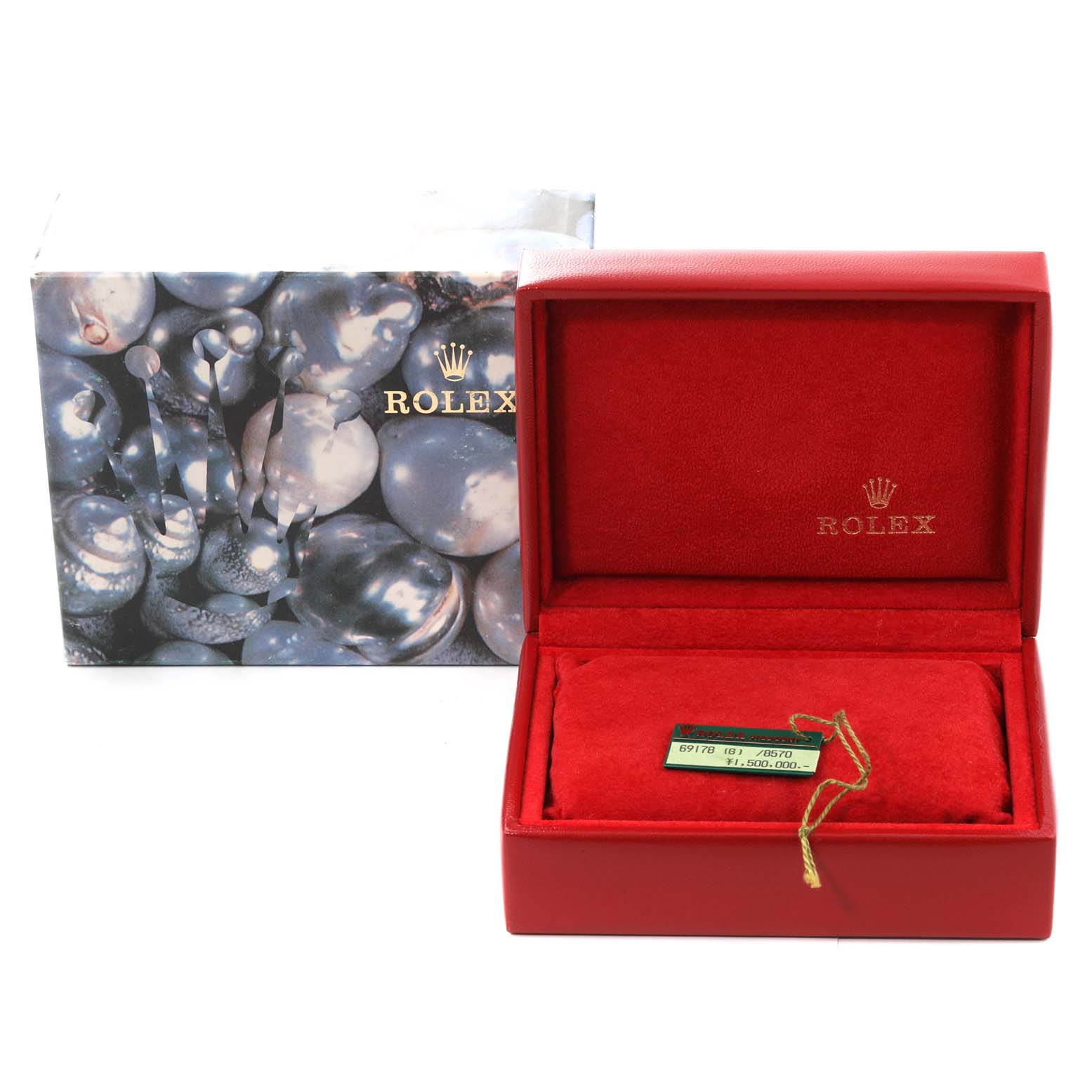 The image shows the open box of a Rolex President 69178 Women
s Yellow Gold Champagne Dial 69178 Women
s Yellow Gold Champagne Dial model watch, featuring the box and tag.