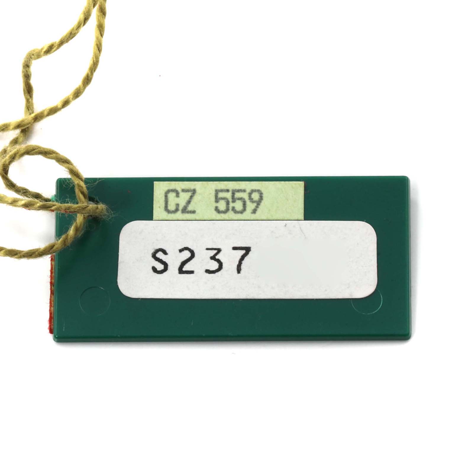 The image shows a green tag with "CZ 559" and "S237," likely a label or accessory for a Rolex President 69178 Women
s Yellow Gold Champagne Dial 69178 Women
s Yellow Gold Champagne Dial model watch.