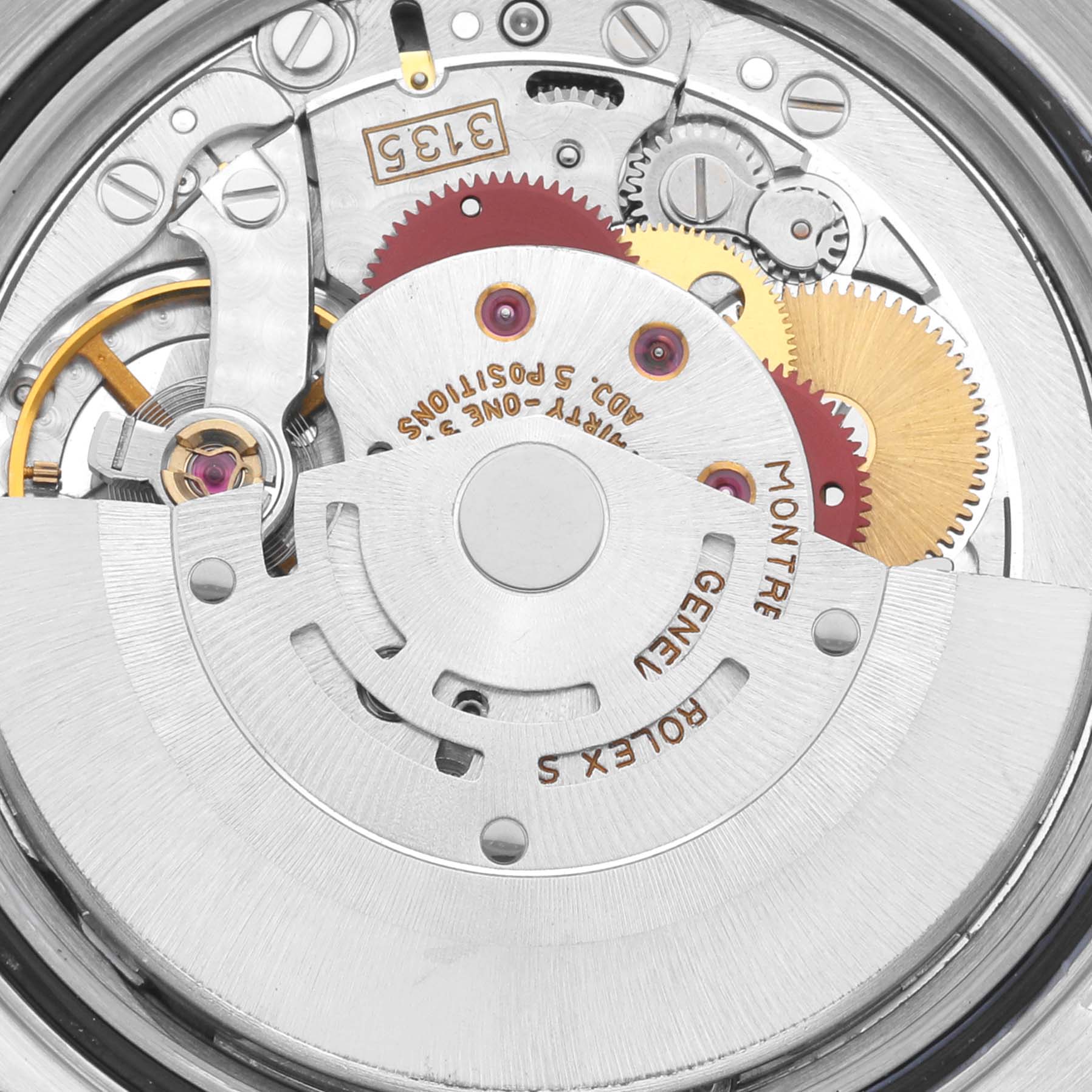 The image shows a close-up view of the movement mechanism of a Rolex Datejust 16220 Men's Stainless Steel Silver Dial 16220 Men's Stainless Steel Silver Dial watch, highlighting gears and components.