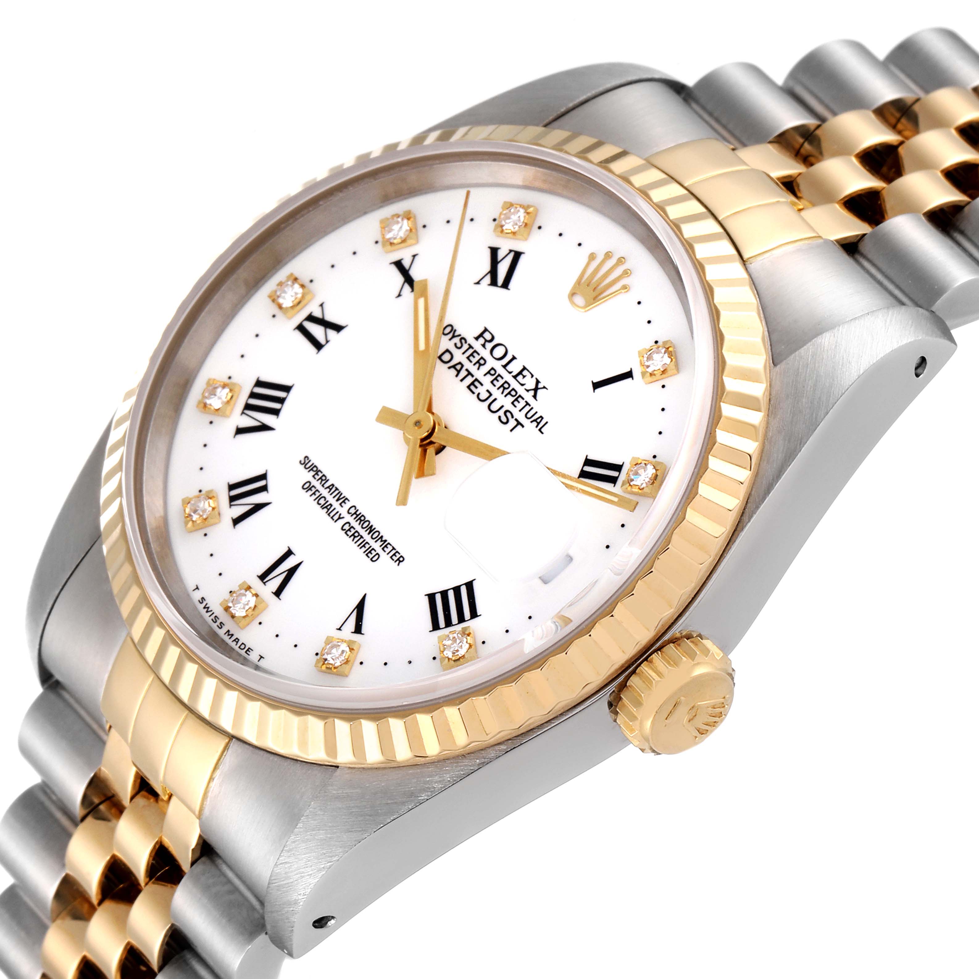 The image shows a close-up, angled view of the Rolex Datejust 16233 Men's Steel and Gold (two tone) White Dial 16233 Men's Steel and Gold (two tone) White Dial watch, highlighting its face, bezel, crown, and part of its bracelet.