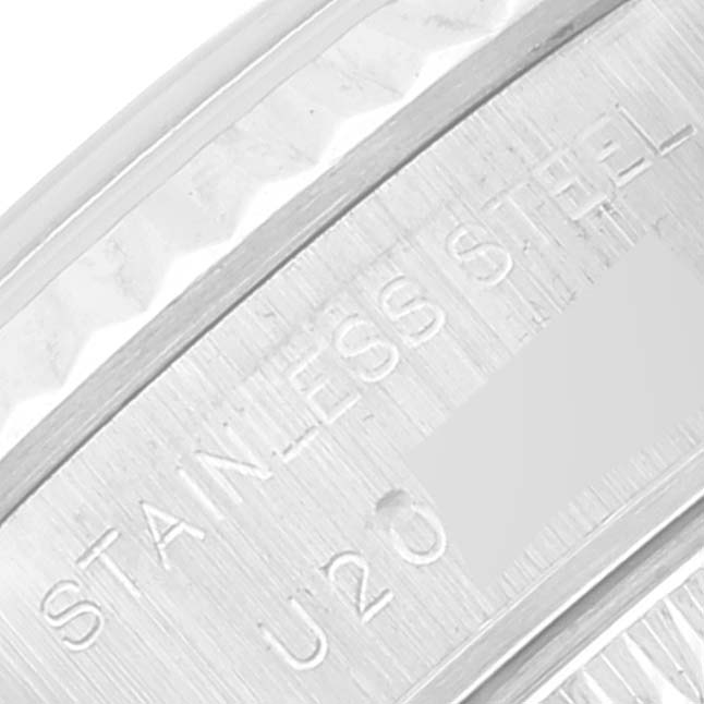 This close-up image shows the side view and part of the stainless steel casing of a Rolex Datejust 69174 Women's Stainless Steel Blue Dial 69174 Women's Stainless Steel Blue Dial watch.