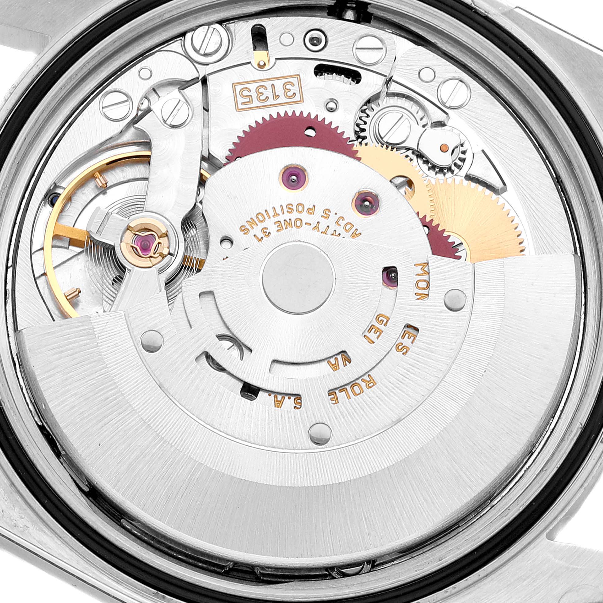 This image shows the inner mechanics and movement of a Rolex Datejust 16234 Men's Stainless Steel Silver Dial 16234 Men's Stainless Steel Silver Dial watch from a close-up, rear angle.