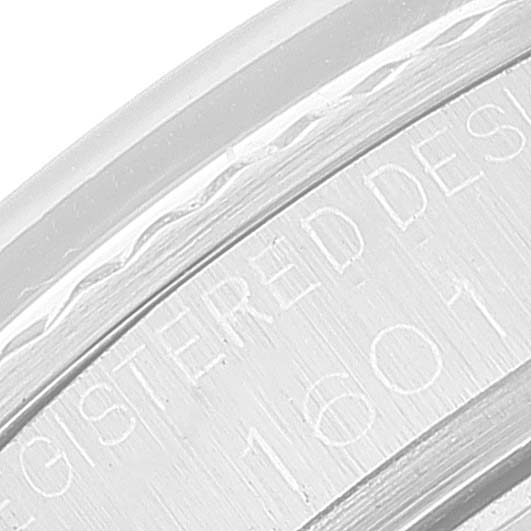 The image shows a close-up of the engraved side of the case of the Rolex Vintage Collection 1601 Men
s Stainless Steel Silver Dial 1601 Men
s Stainless Steel Silver Dial model.