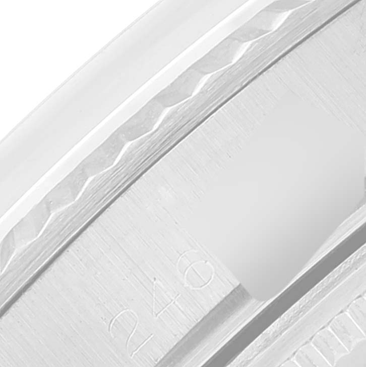 This close-up image shows the bezel and part of the case from the Rolex Vintage Collection 1601 Men
s Stainless Steel Silver Dial 1601 Men
s Stainless Steel Silver Dial watch.