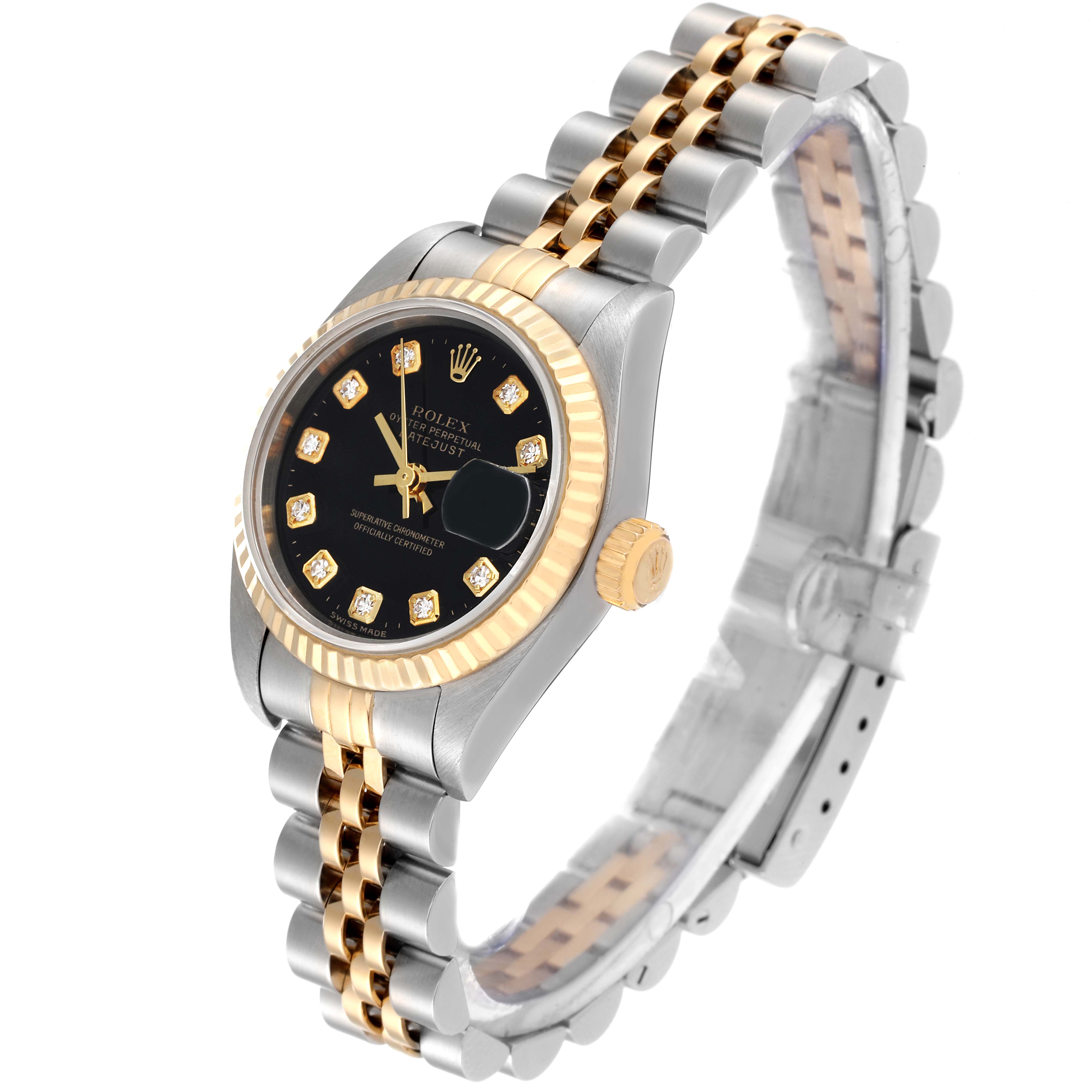 The image shows the Rolex Datejust 79173 Women's Steel and Gold (two tone) Black Dial 79173 Women's Steel and Gold (two tone) Black Dial watch at a slight angle, displaying its two-tone bracelet, black dial, and fluted bezel.