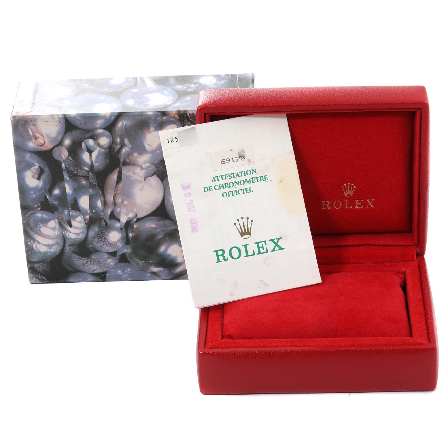 The image shows a red Rolex Datejust 69173G Women's Steel and Gold (two tone) Green Dial 69173G Women's Steel and Gold (two tone) Green Dial watch box, a certificate, and an outer decorative box at a slightly angled frontal view.