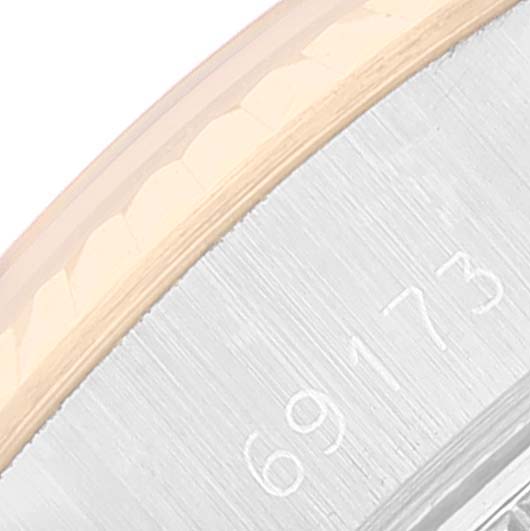 The image shows a close-up of the side case of a Rolex Datejust 69173 Women
s Steel and Gold (two tone) Champagne Dial 69173 Women
s Steel and Gold (two tone) Champagne Dial watch, highlighting the reference number "69173."