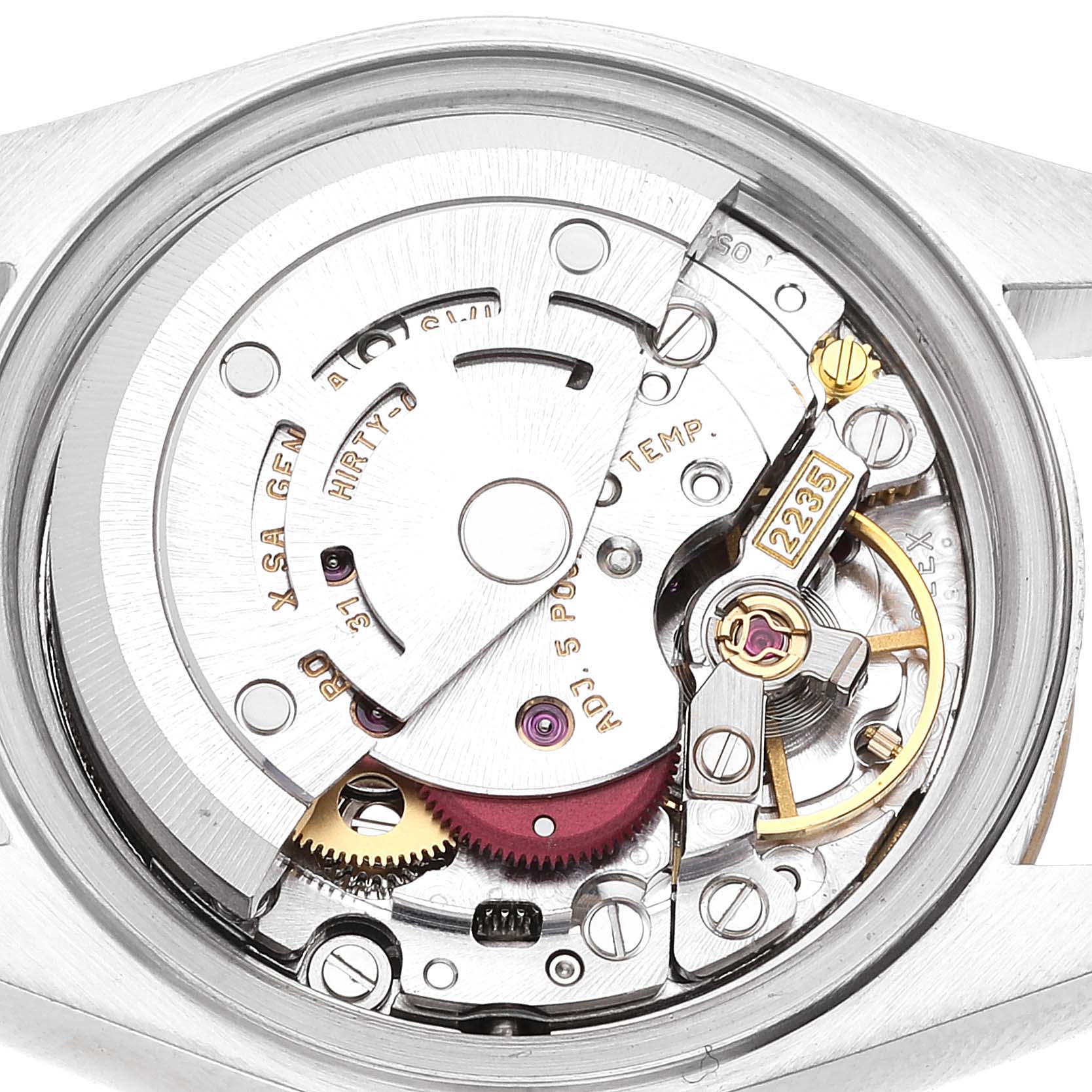 The image shows a close-up of the internal mechanism of a Rolex Datejust 79173 Women's Steel and Gold (two tone) White Dial 79173 Women's Steel and Gold (two tone) White Dial watch, highlighting the movement components.