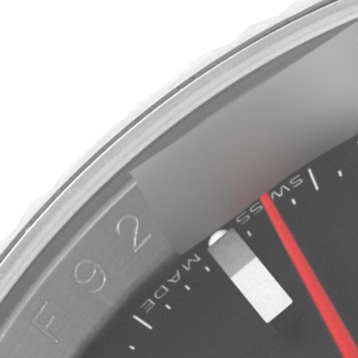 This image shows a close-up of the dial and bezel of a Rolex Turn-o-Graph 116264 Men's Stainless Steel Black Dial 116264 Men's Stainless Steel Black Dial model, highlighting the "Swiss Made" label and part of the '2' marker.