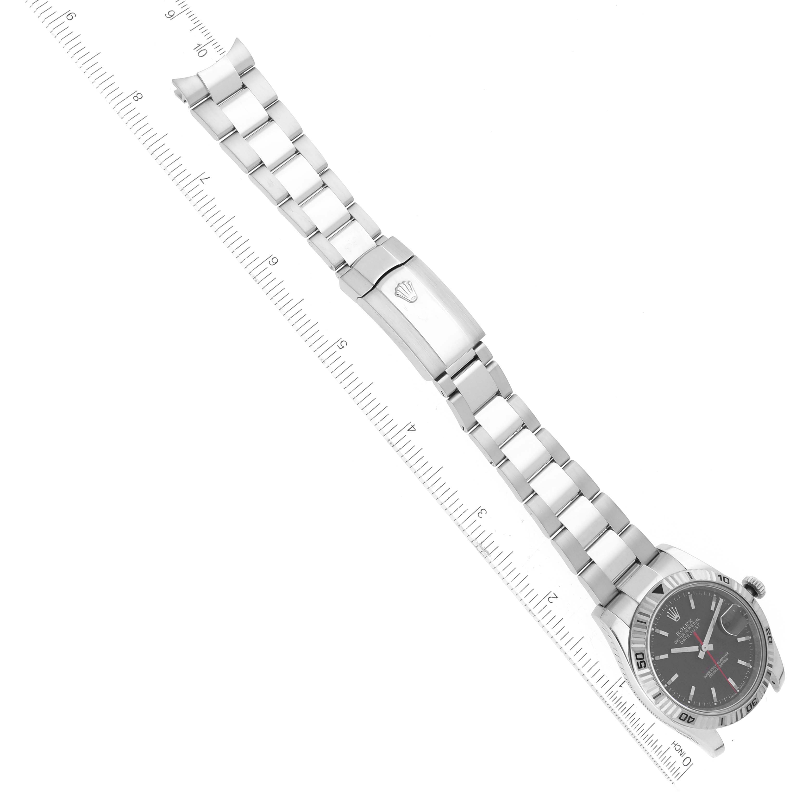 The Rolex Turn-o-Graph 116264 Men's Stainless Steel Black Dial 116264 Men's Stainless Steel Black Dial watch is shown from a top-down angle, highlighting its bracelet, clasp, and dial.