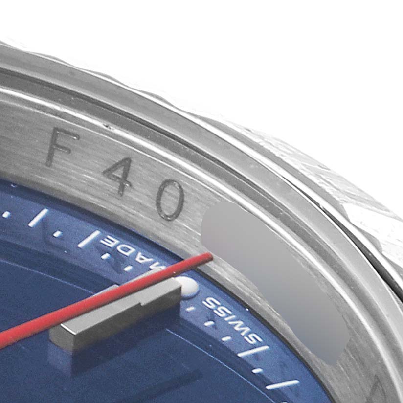 This image shows a close-up of the bezel and dial of a Rolex Turn-o-Graph 116264 Men
s Stainless Steel Blue Dial 116264 Men
s Stainless Steel Blue Dial watch, highlighting the markings and red seconds hand.