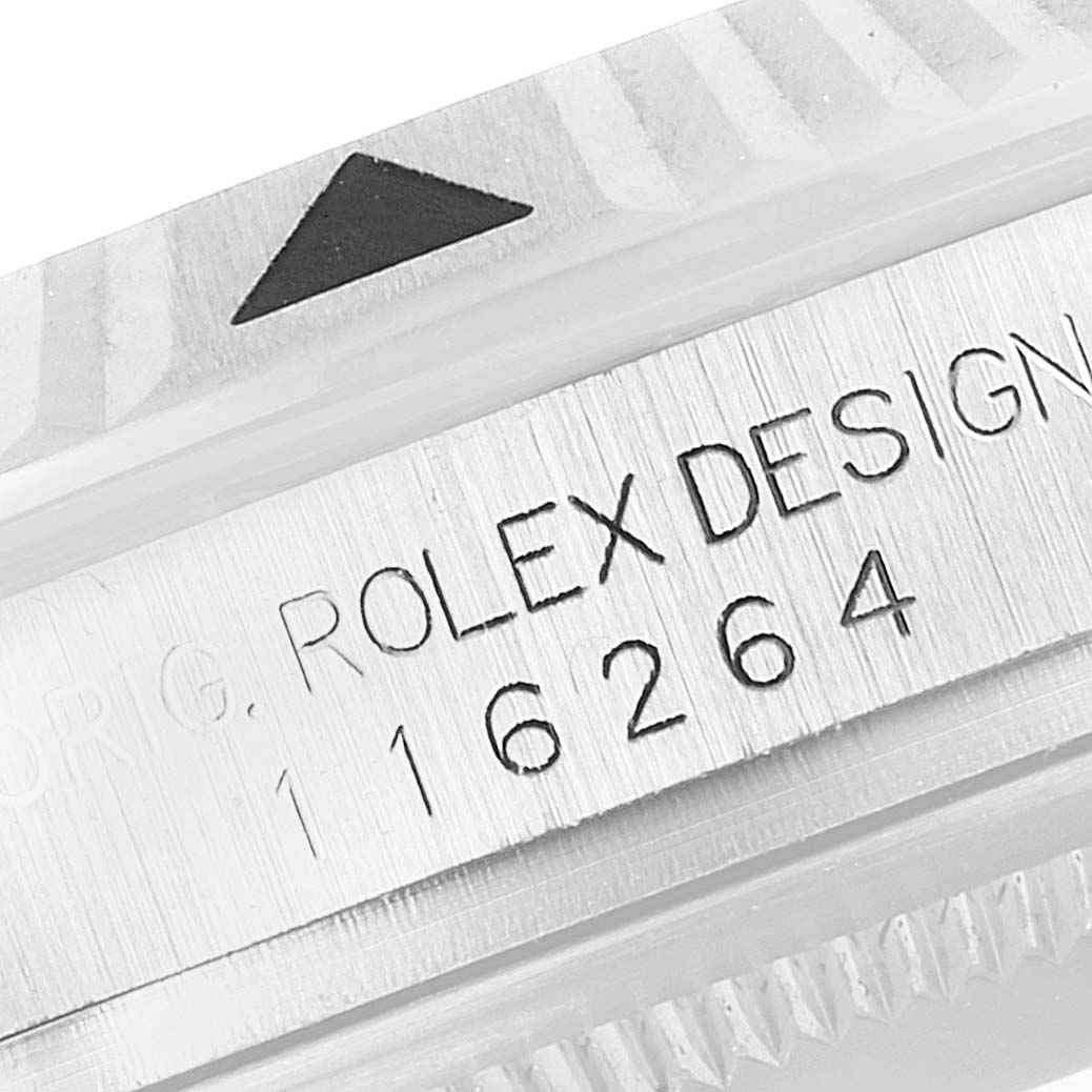 This close-up image shows the bezel and engraved model number of the Rolex Turn-o-Graph 116264 Men
s Stainless Steel Blue Dial 116264 Men
s Stainless Steel Blue Dial watch.