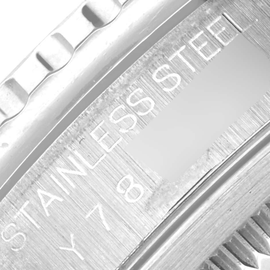 The image shows a close-up view of the stainless steel casing and part of the bezel of a Rolex Turn-o-Graph 16264 Men's Stainless Steel Black Dial 16264 Men's Stainless Steel Black Dial watch.
