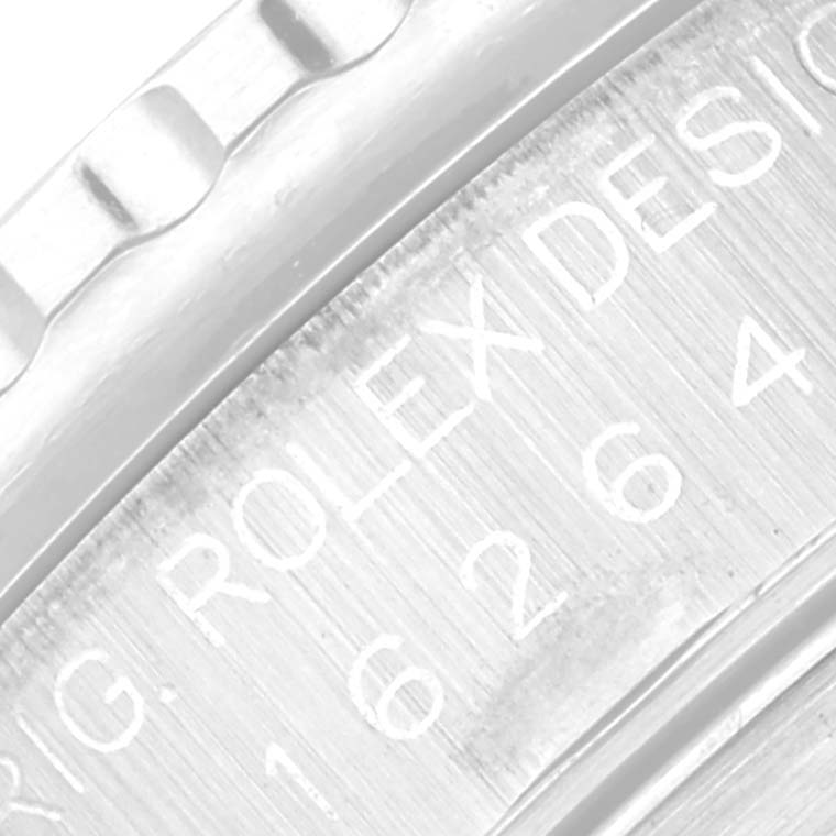 This close-up shows the engraved side of the case and part of the bezel of the Rolex Turn-o-Graph 16264 Men's Stainless Steel Black Dial 16264 Men's Stainless Steel Black Dial watch.