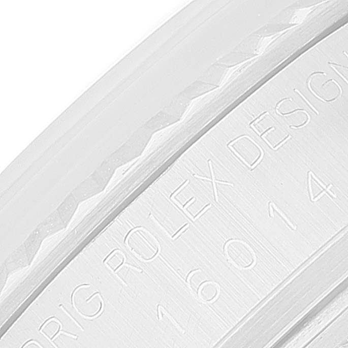 The image shows an angled close-up of the case back and serial number of a Rolex Vintage Collection 16014 Men
s Stainless Steel Silver Dial 16014 Men
s Stainless Steel Silver Dial watch.